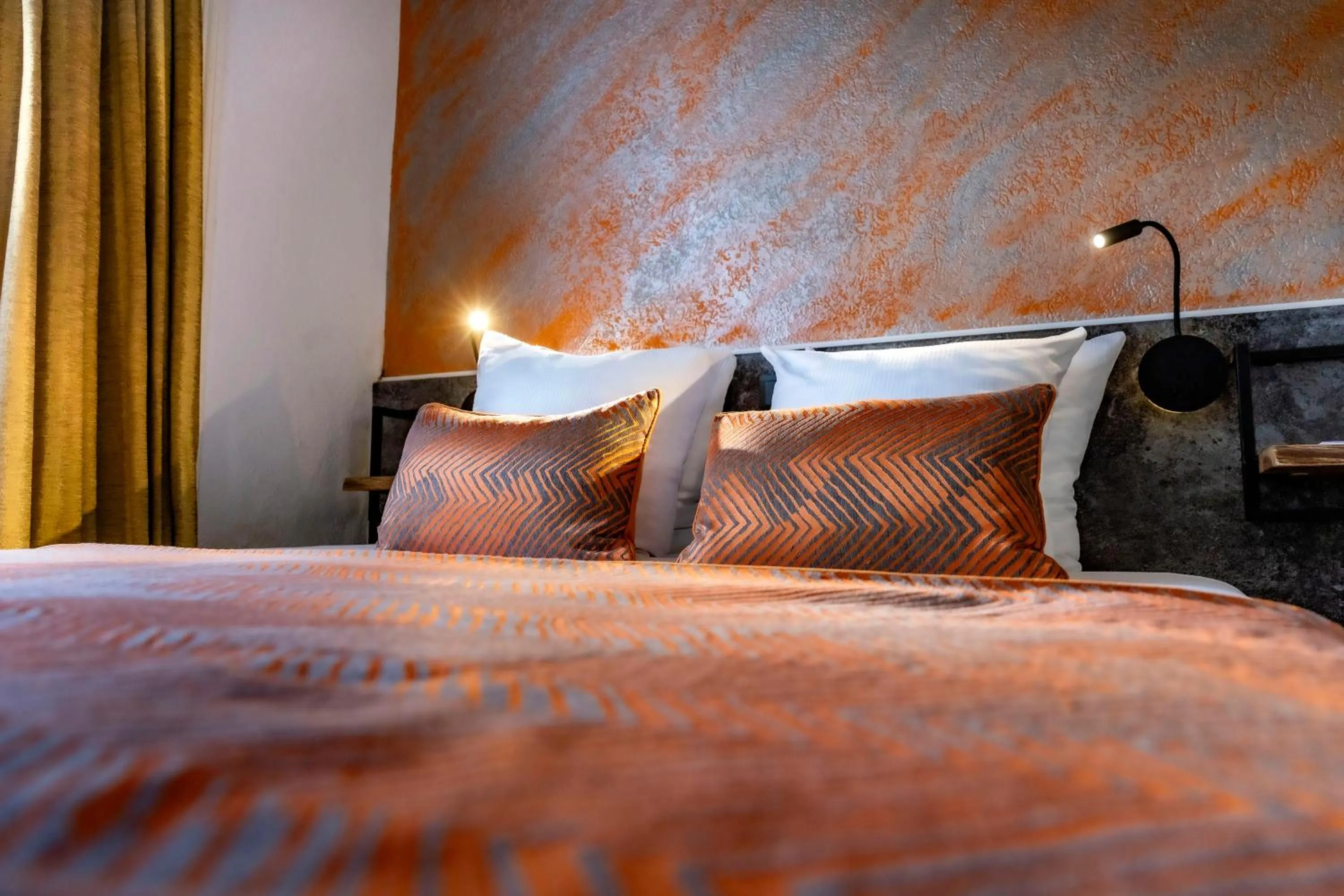 Bed in Jupiter Hotel