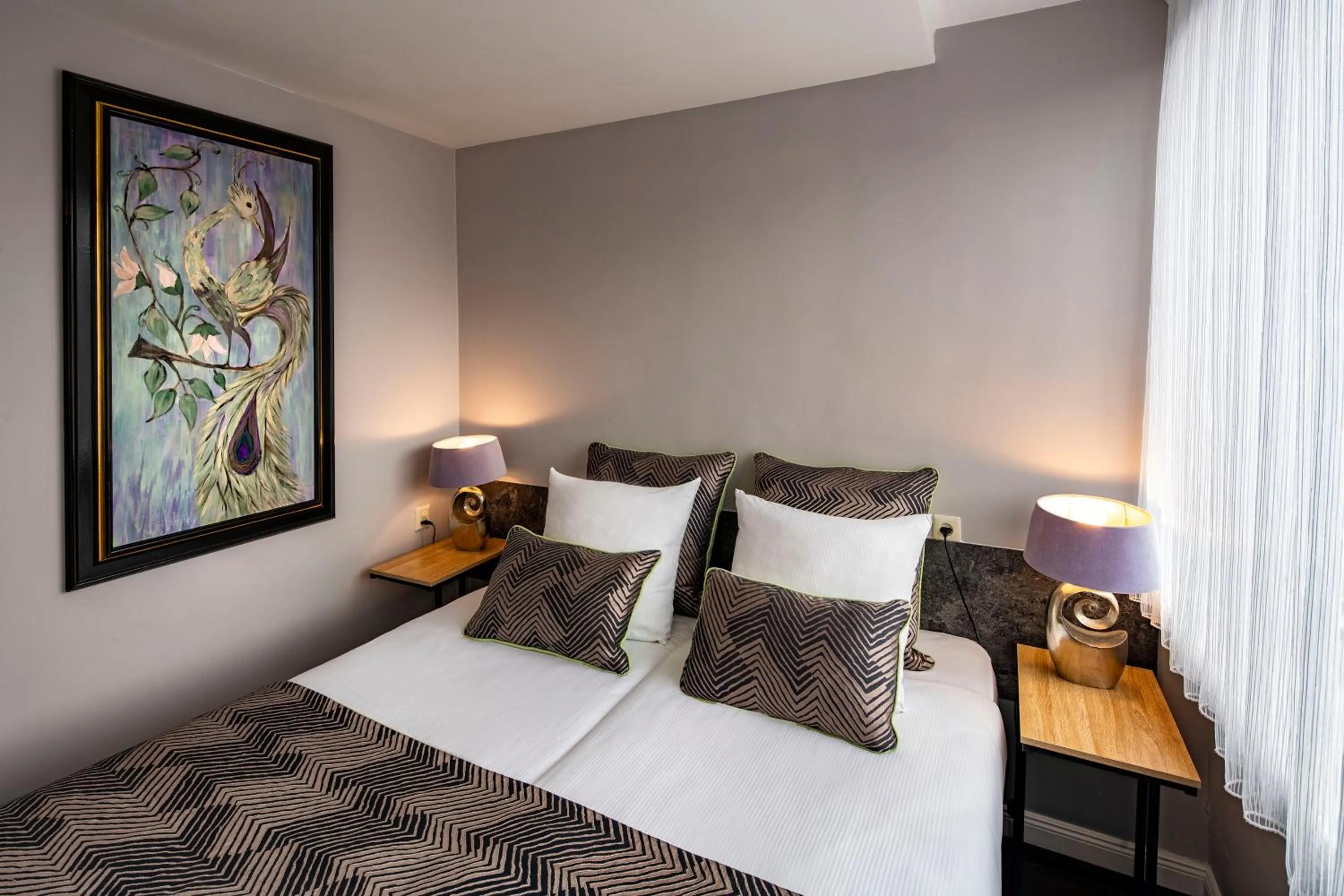 Bed in Jupiter Hotel