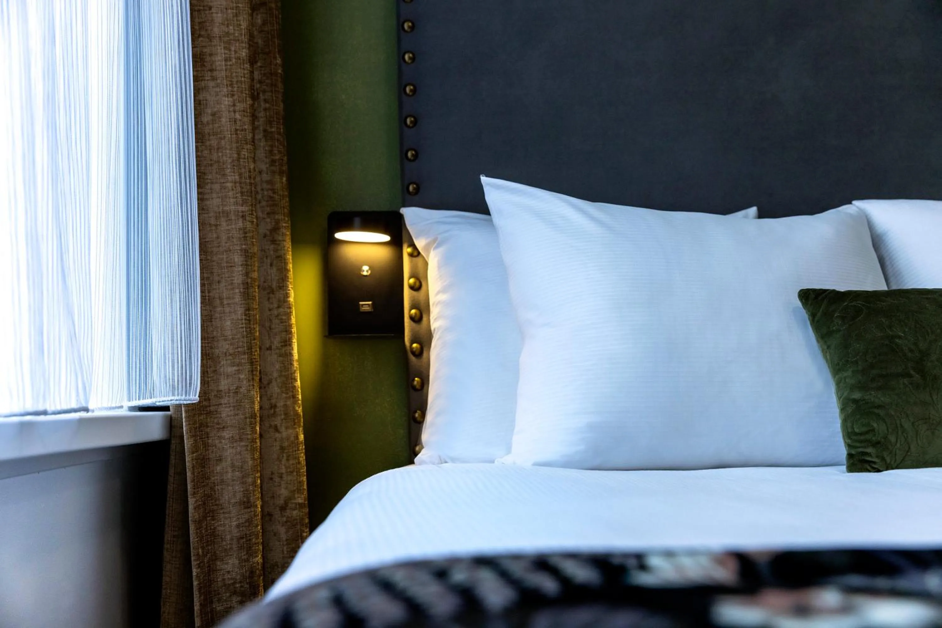 Bed in Jupiter Hotel