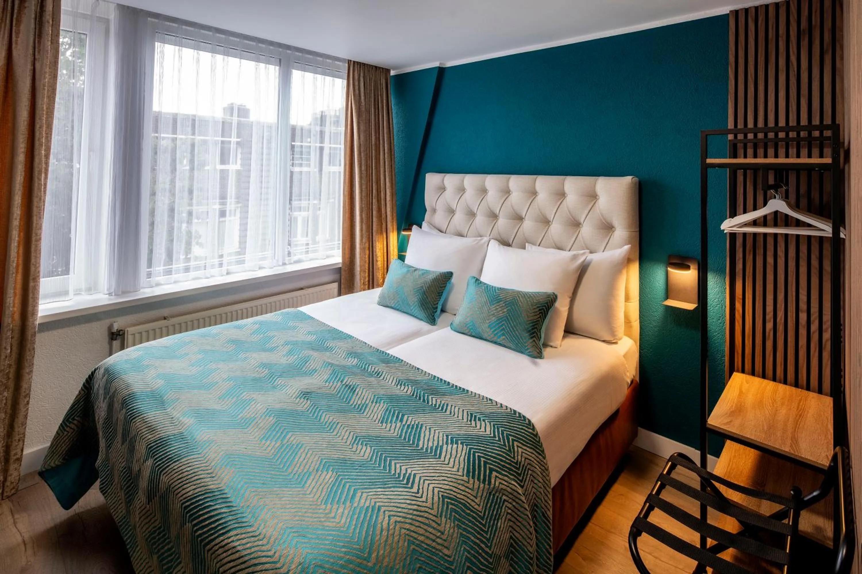 Bed in Jupiter Hotel