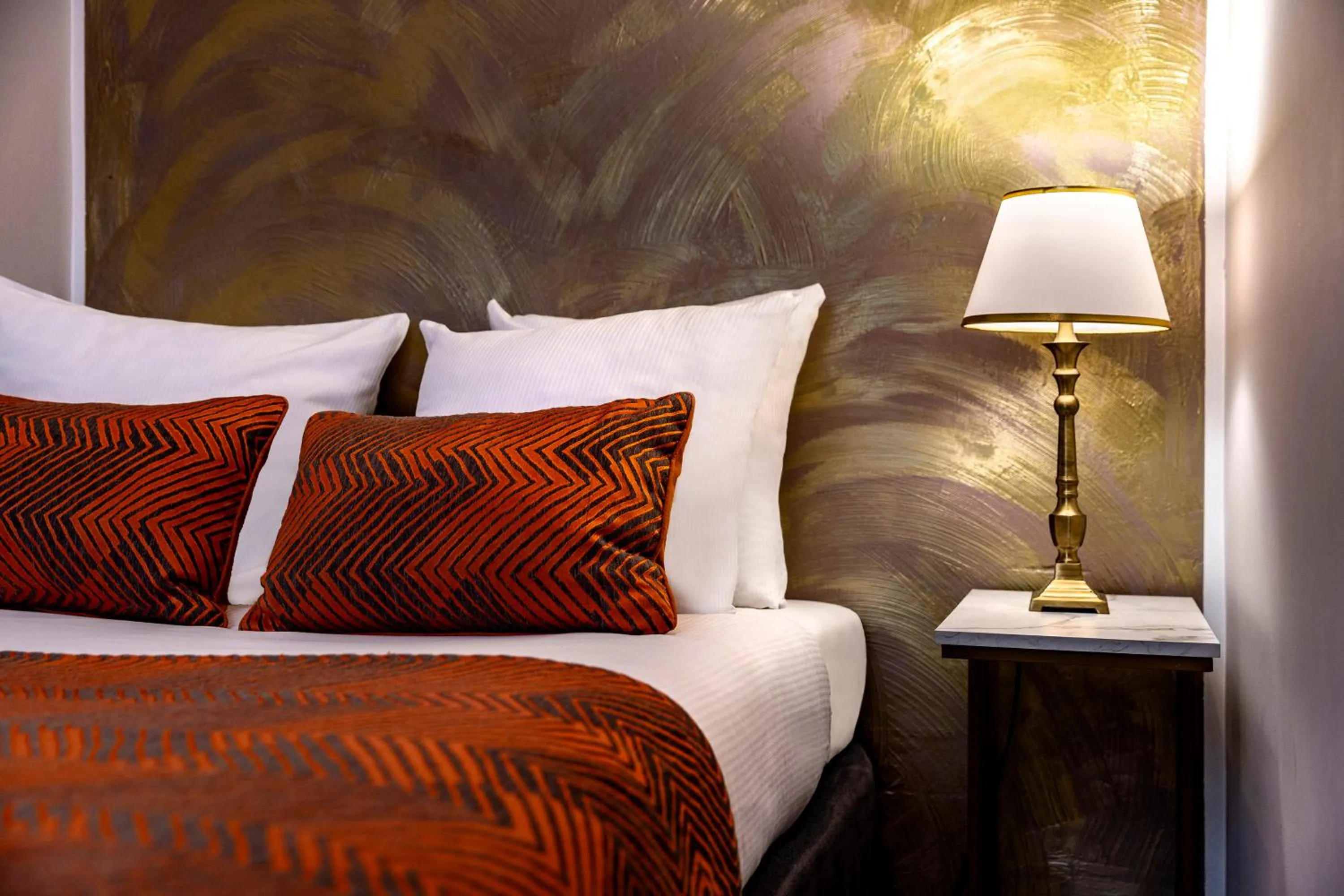 Bed in Jupiter Hotel