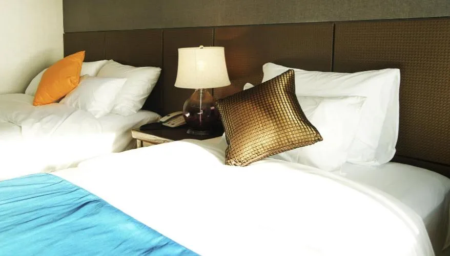 Bed in Login Hotel