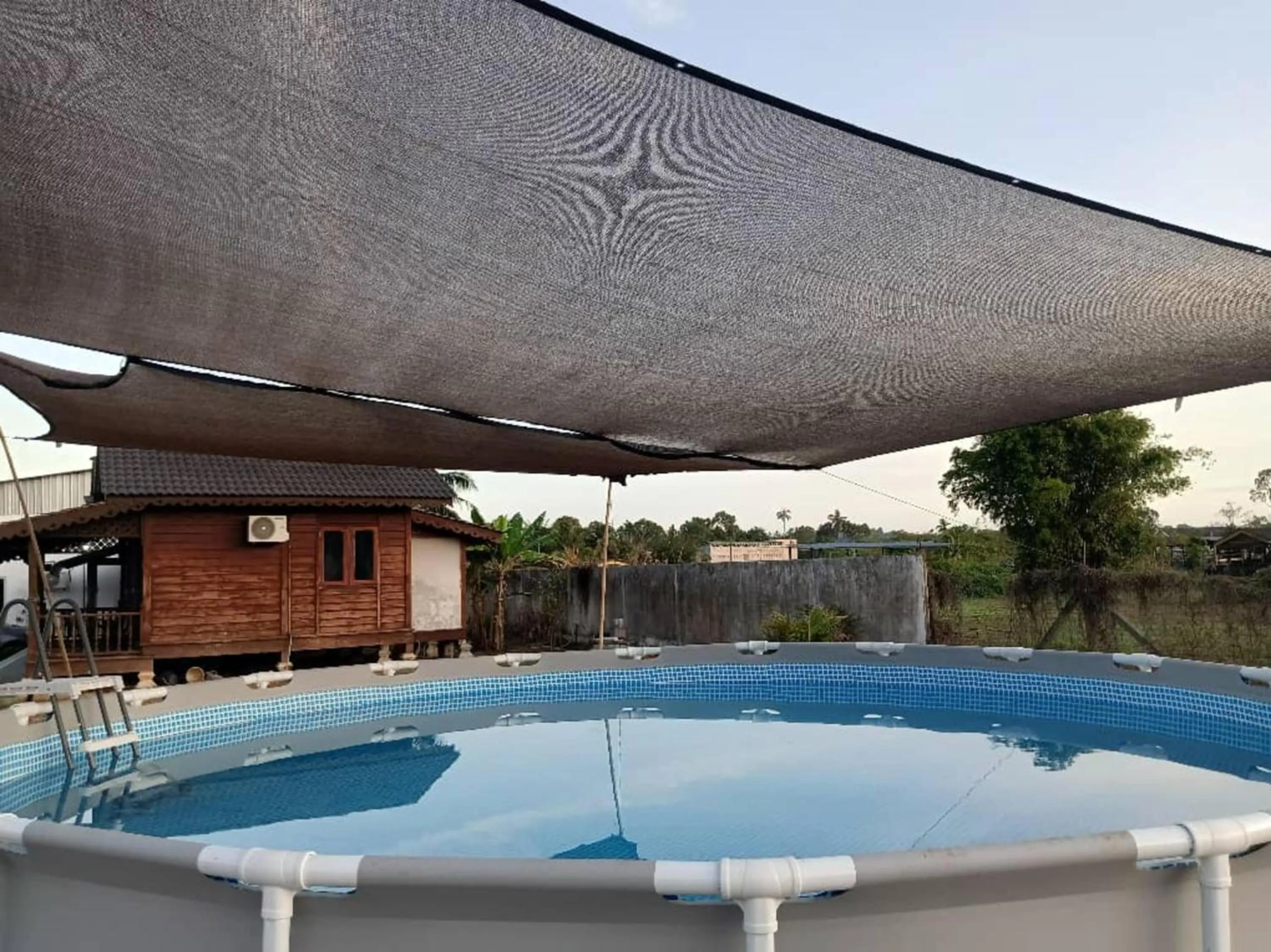 Swimming pool in Hotel O Sri Ayu Inn