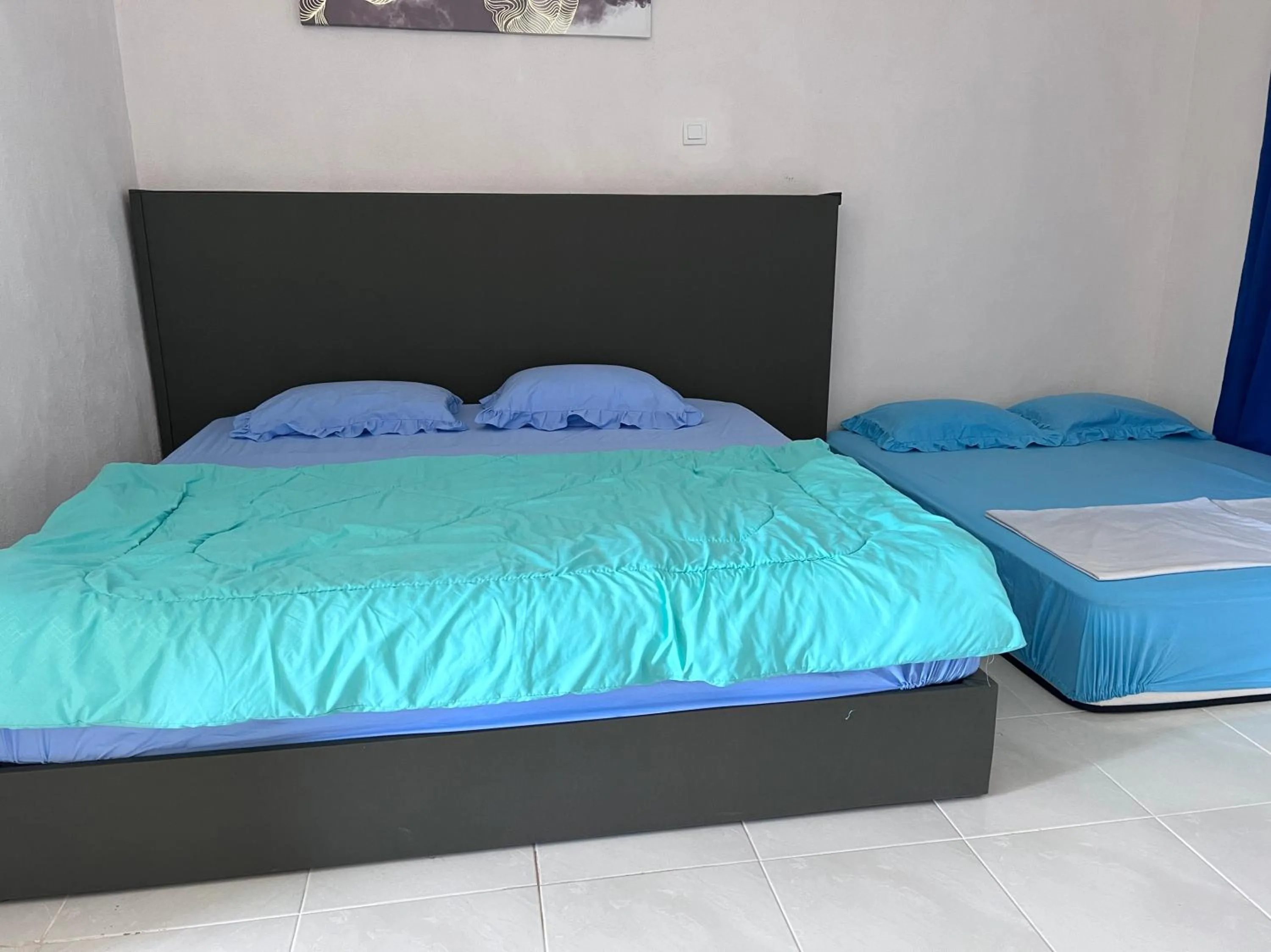 Bedroom, Bed in Hotel O Sri Ayu Inn