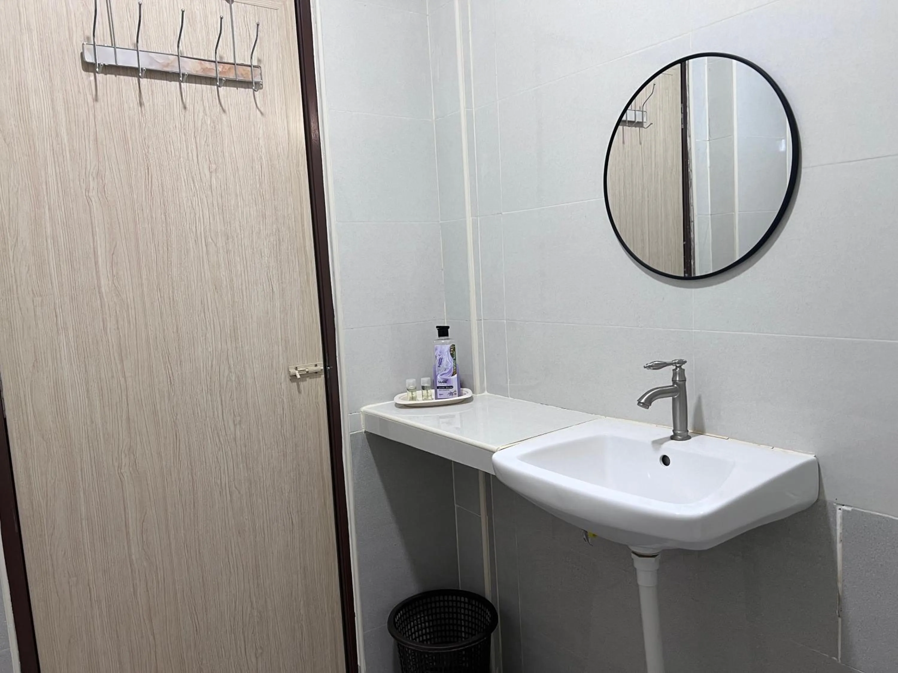 Bedroom in Hotel O Sri Ayu Inn