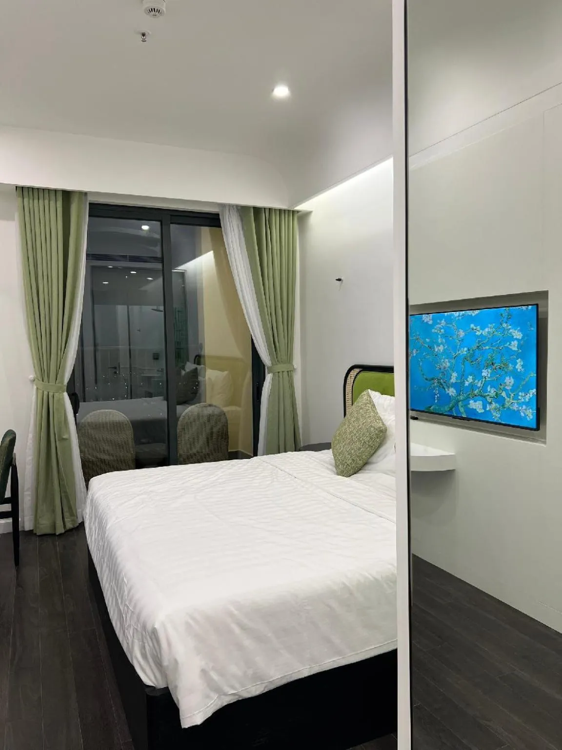 Bed in We Young Apartments by HOFs - Fireworks & Ocean view