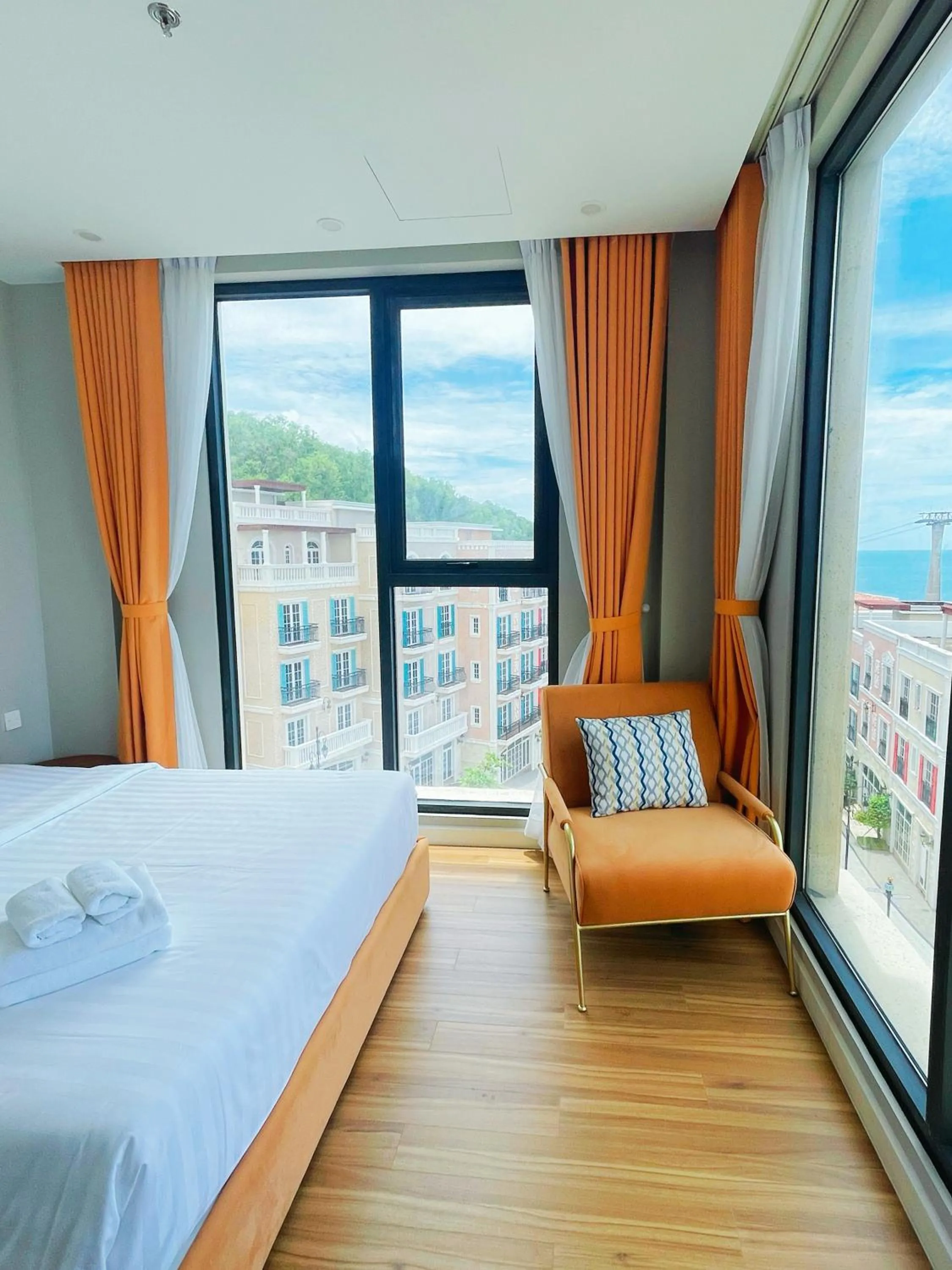 Bed in We Young Apartments by HOFs - Fireworks & Ocean view