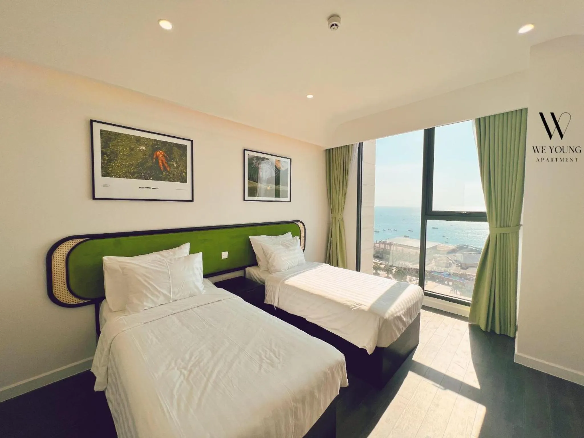 Bedroom, Bed in We Young Apartments by HOFs - Fireworks & Ocean view
