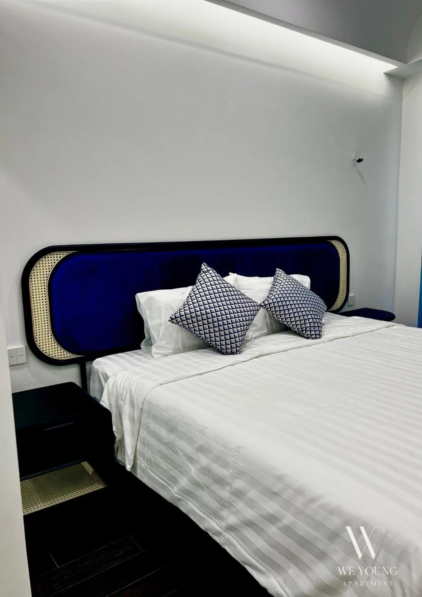 Bedroom, Bed in We Young Apartments by HOFs - Fireworks & Ocean view