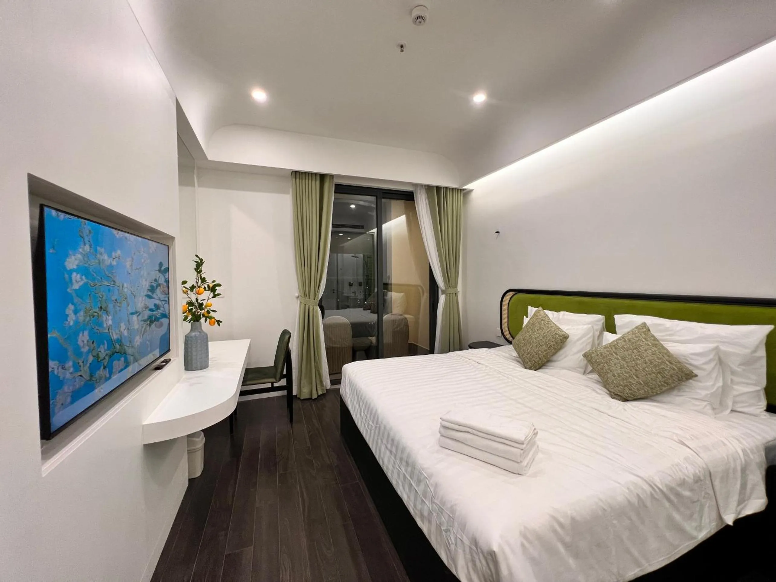 Bed in We Young Apartments by HOFs - Fireworks & Ocean view