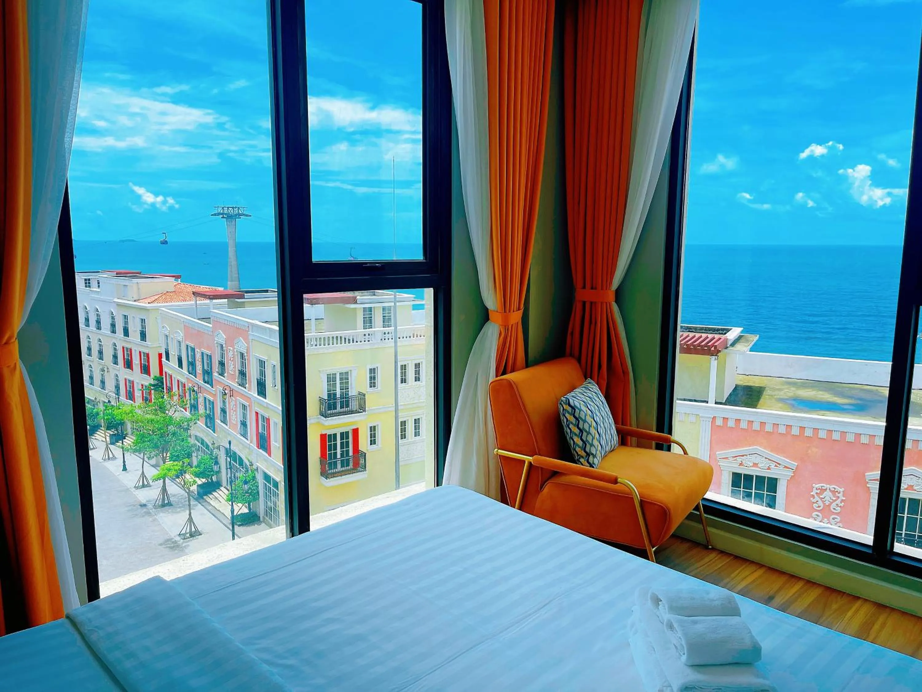 Sea view, Bed in We Young Apartments by HOFs - Fireworks & Ocean view