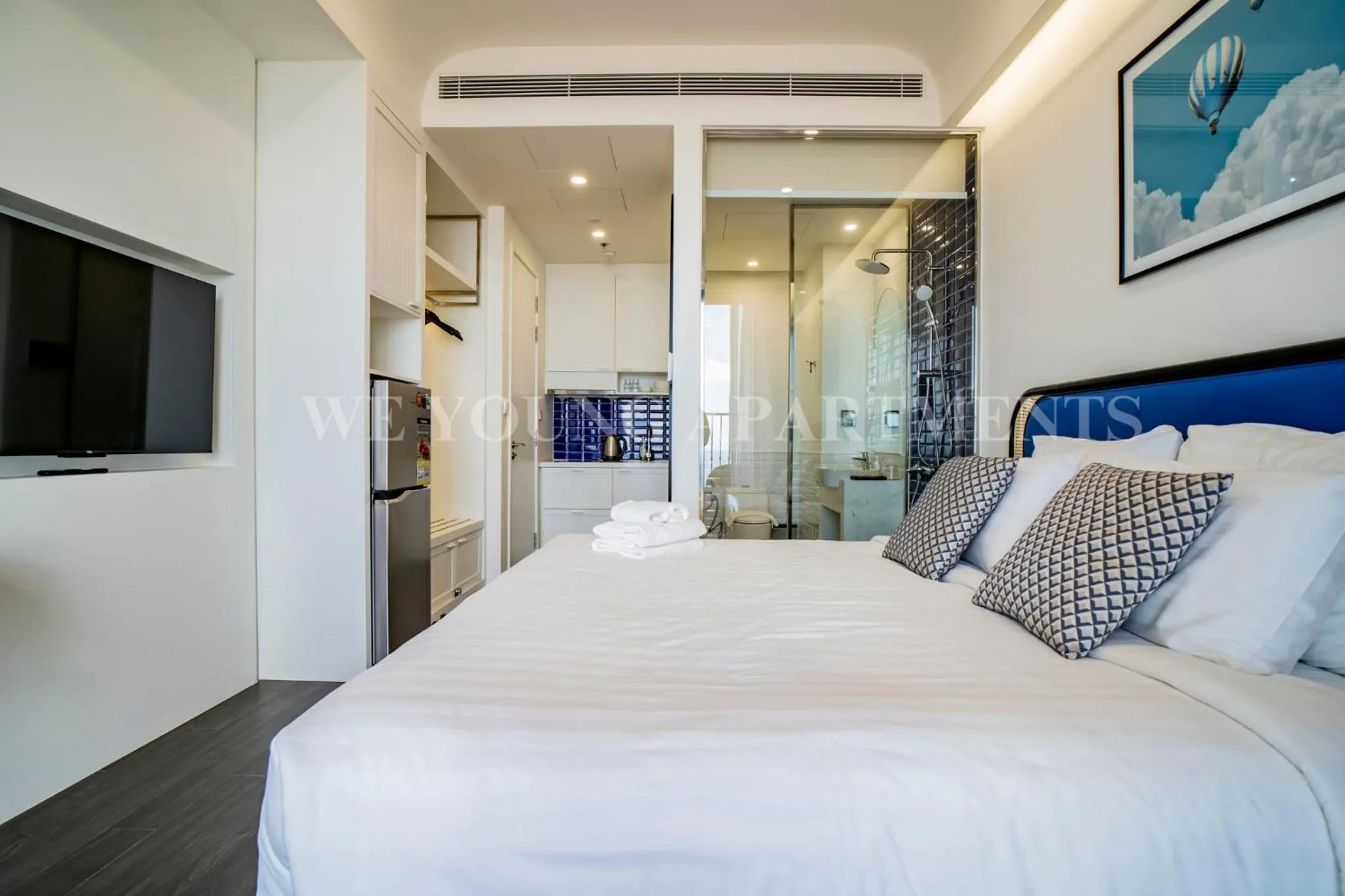 Bed in We Young Apartments by HOFs - Fireworks & Ocean view