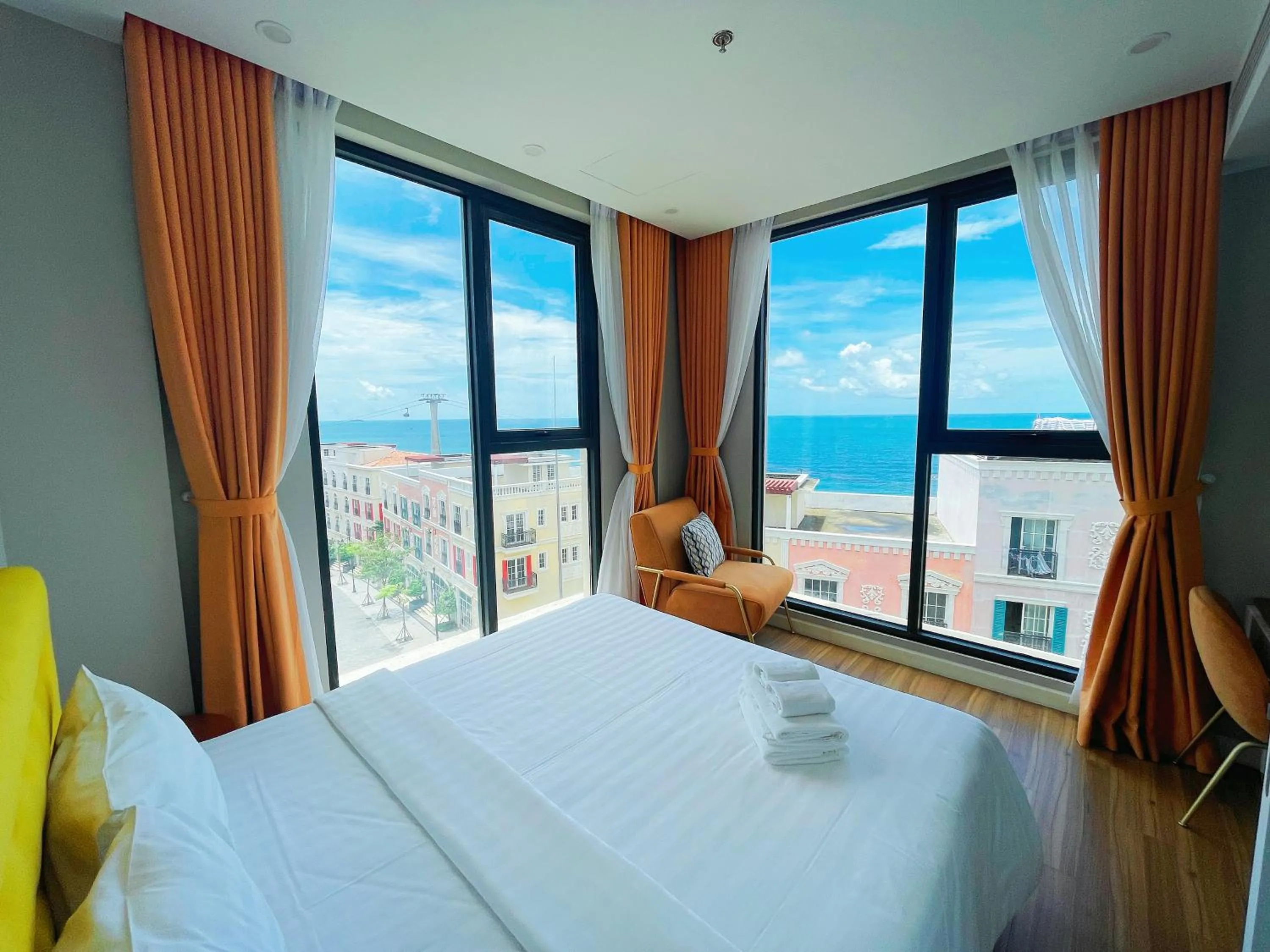 Bed in We Young Apartments by HOFs - Fireworks & Ocean view