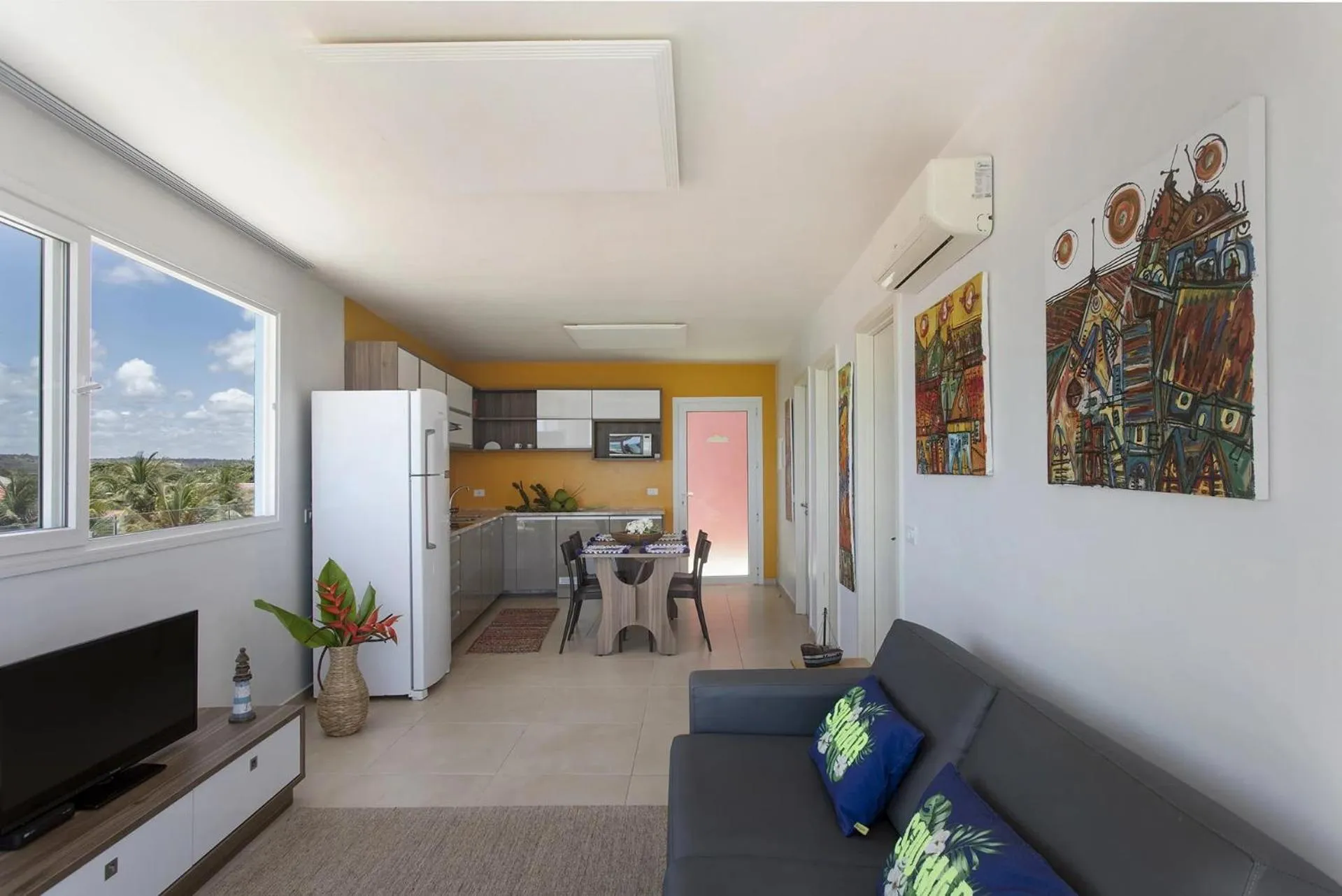 Communal lounge/ TV room in ApartHotel Praia dos Carneiros