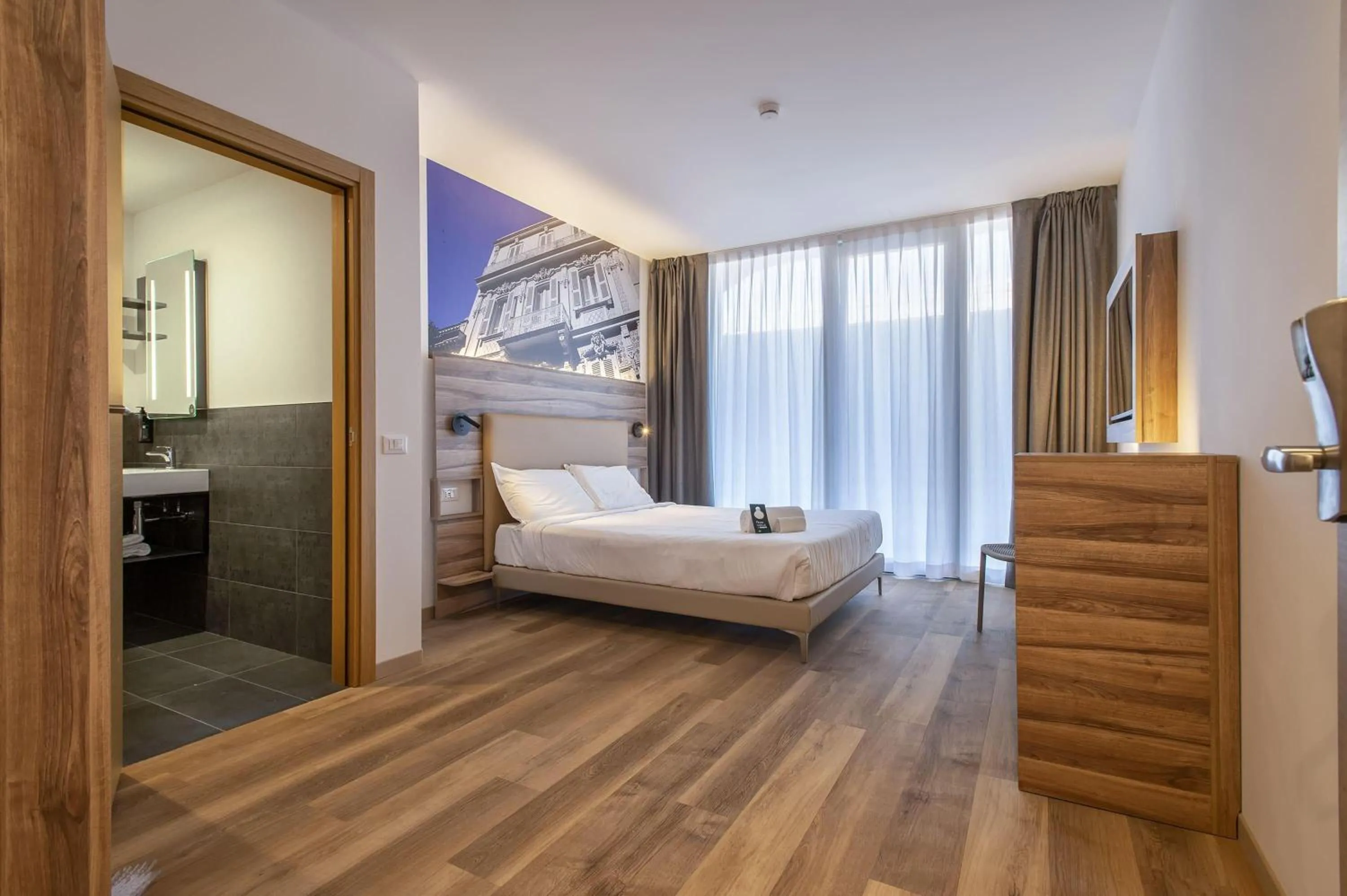 Photo of the whole room, Bed in B&B HOTEL Sassari