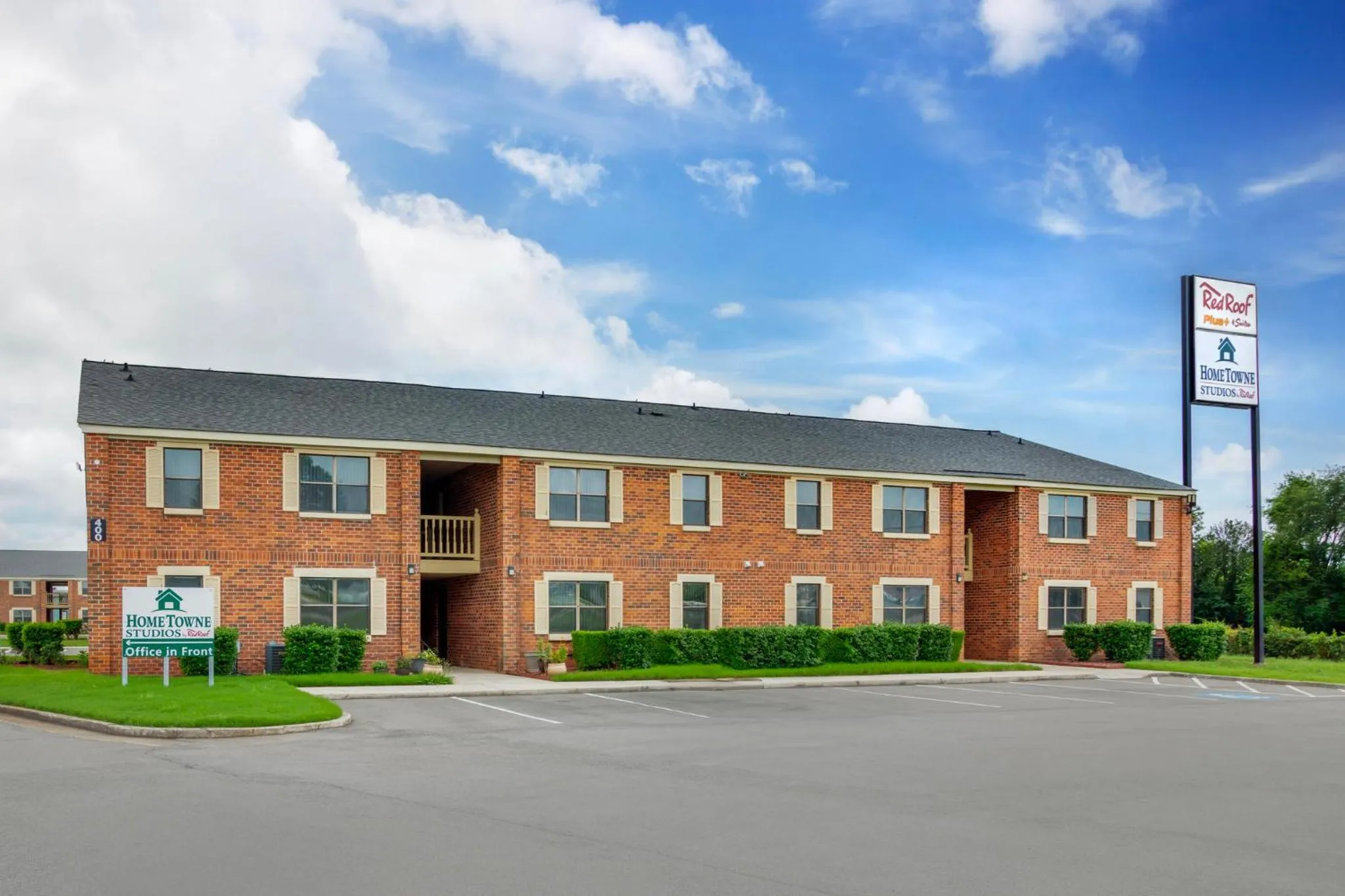 Property building in HomeTowne Studios by Red Roof Huntsville - Madison