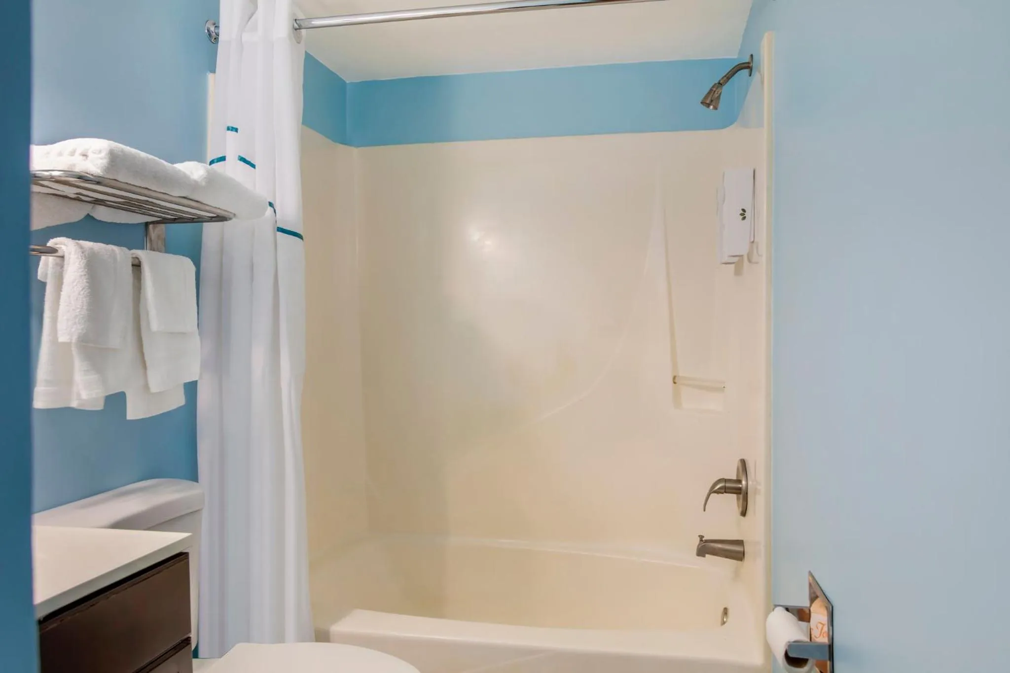 Bathroom in HomeTowne Studios by Red Roof Huntsville - Madison