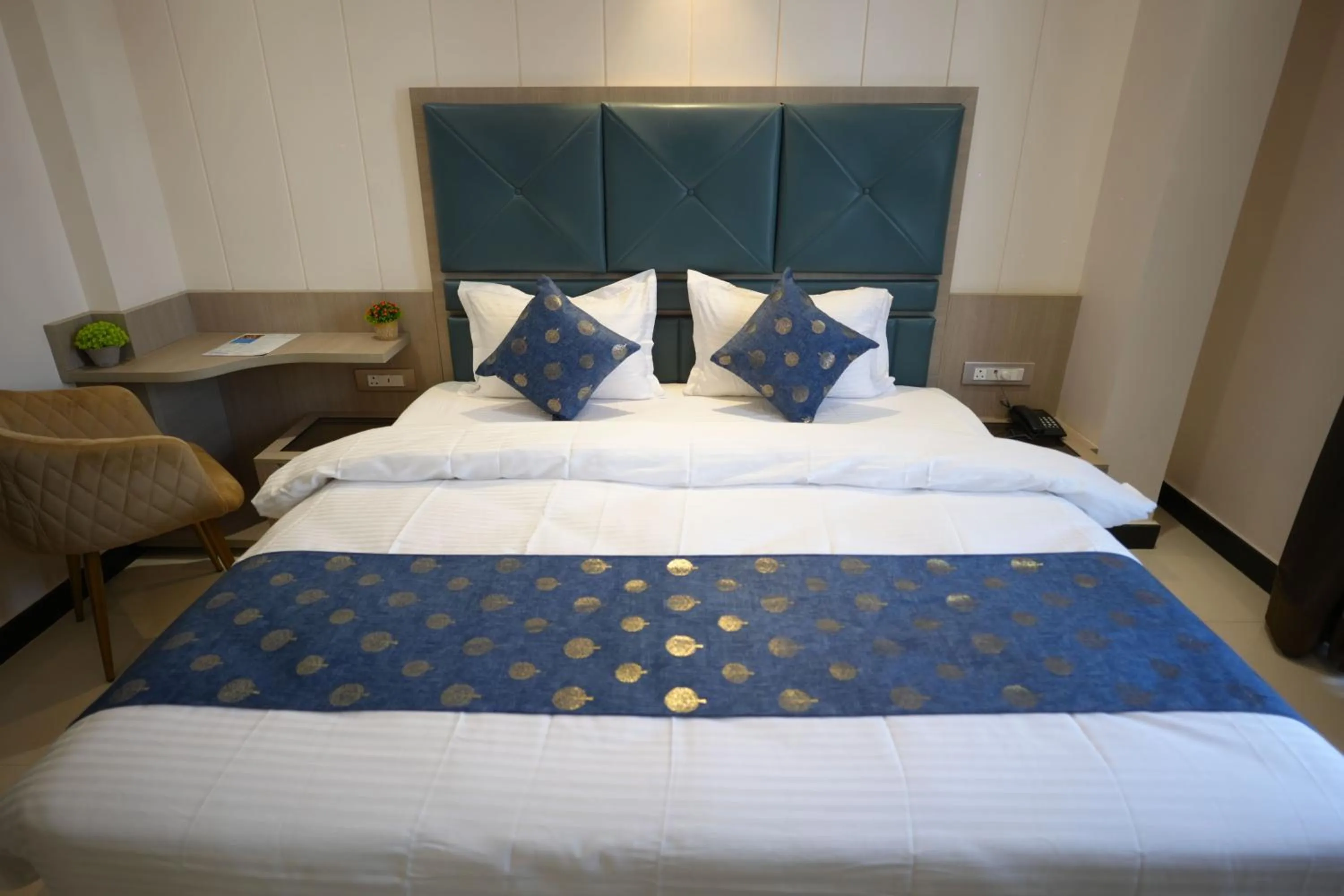 Photo of the whole room, Bed in Sri Shyam Villas Near Kashi Vishwanath Temple