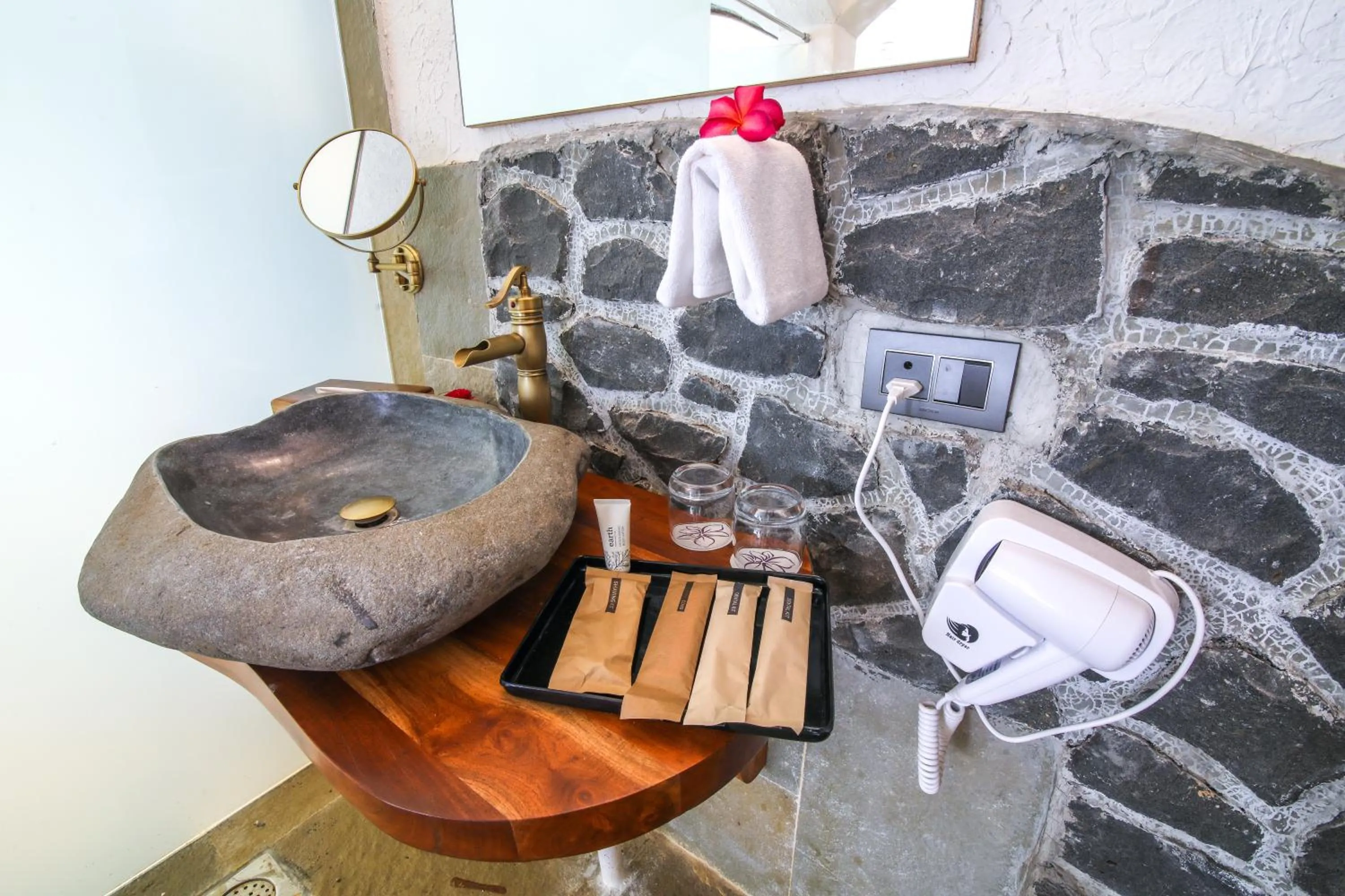 Bathroom in Toyam by Orchid Hotels