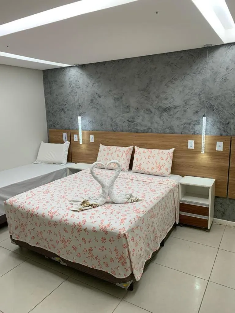 Photo of the whole room, Bed in Pousada Beija Flor