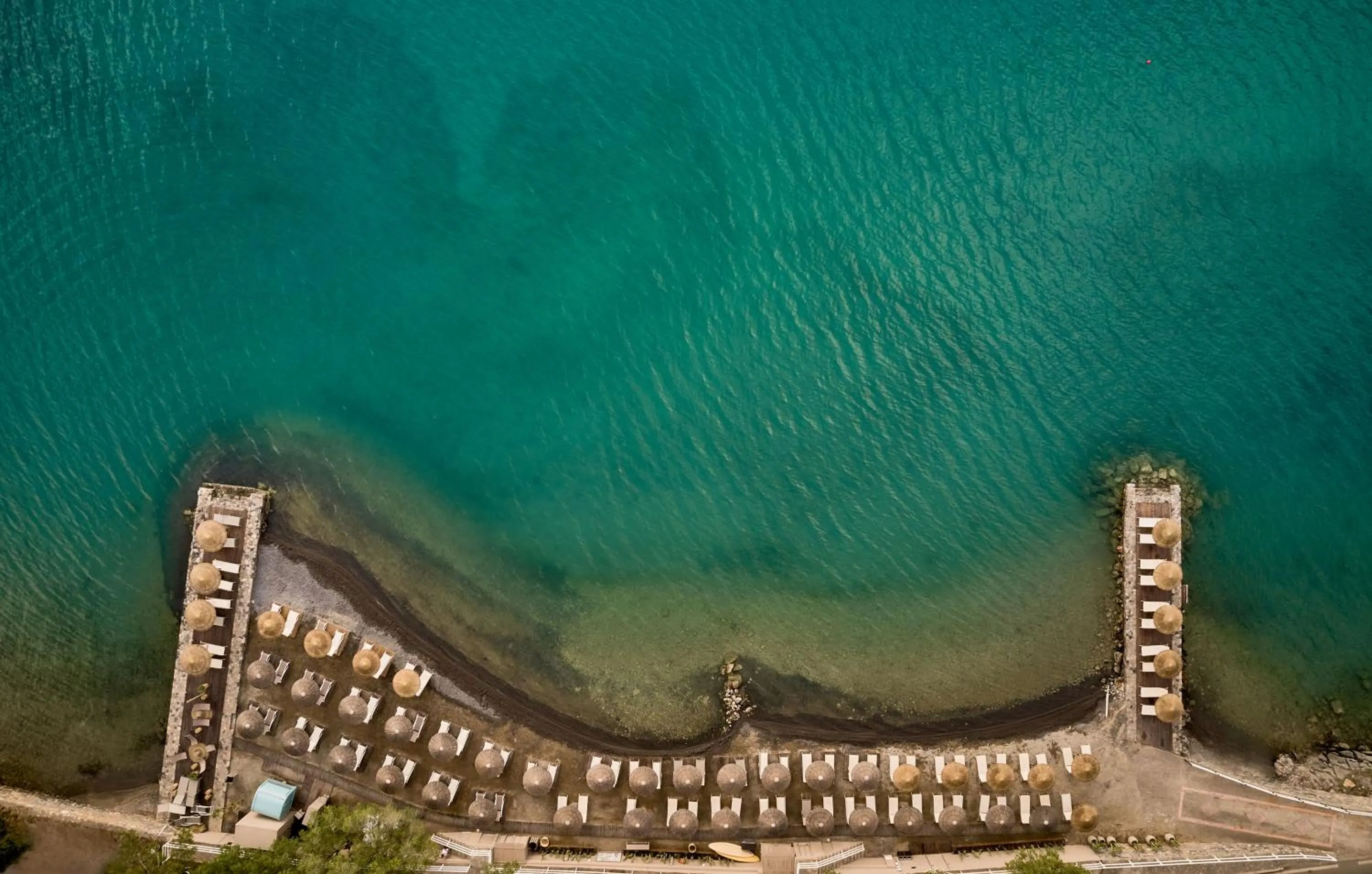 Beach in Domes Aulus Elounda, Adults only, Curio Collection by Hilton