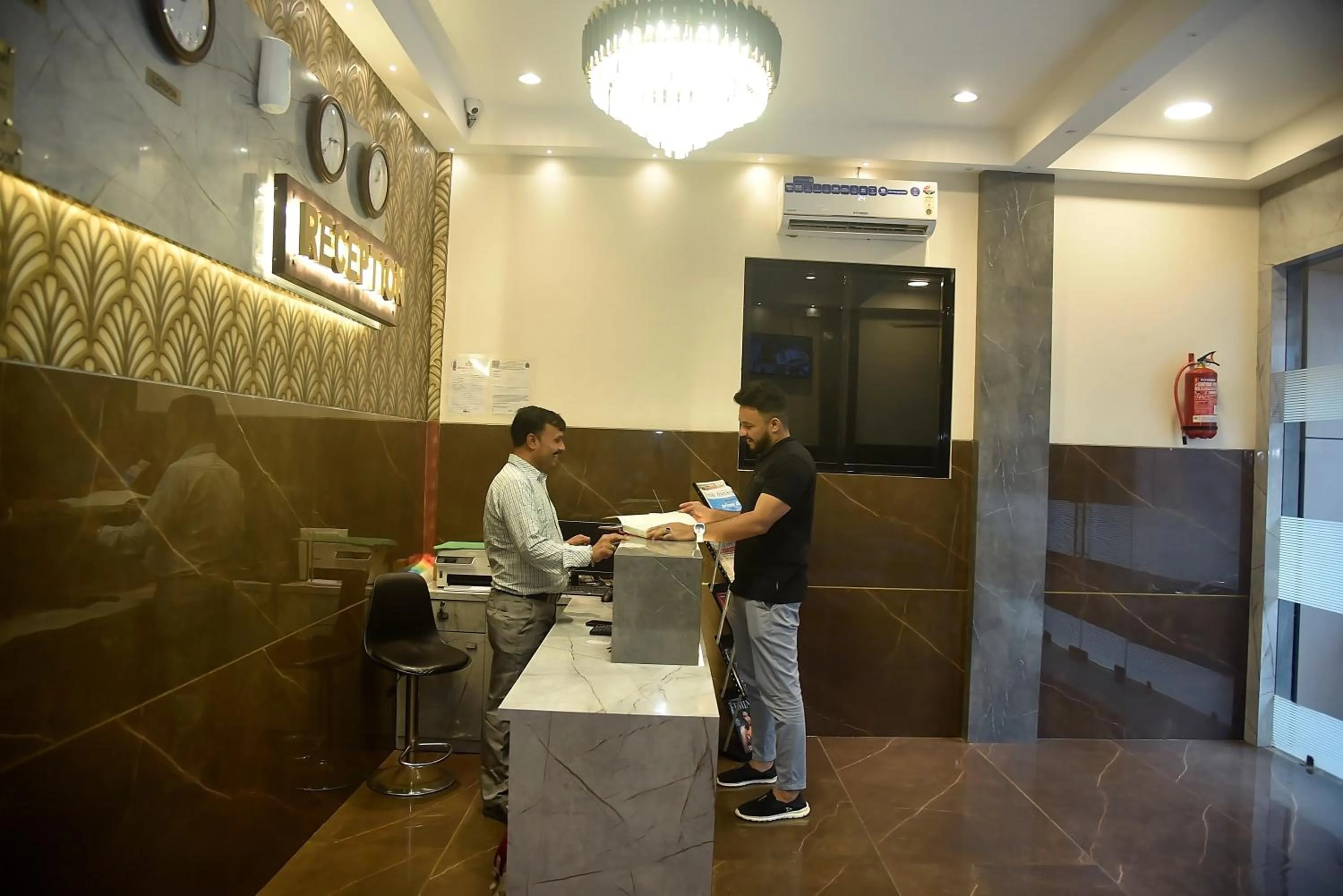 Staff in Hotel Pride Inn