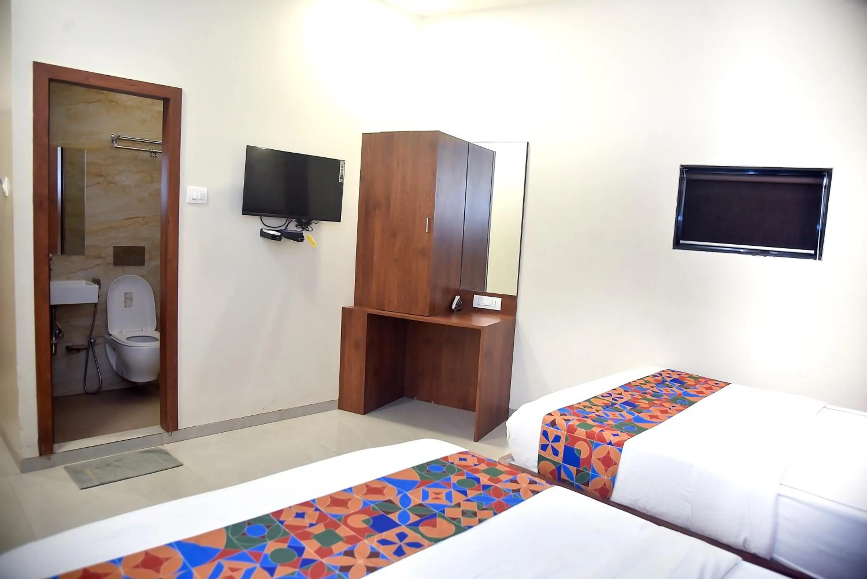 Toilet, Bed in Hotel Pride Inn