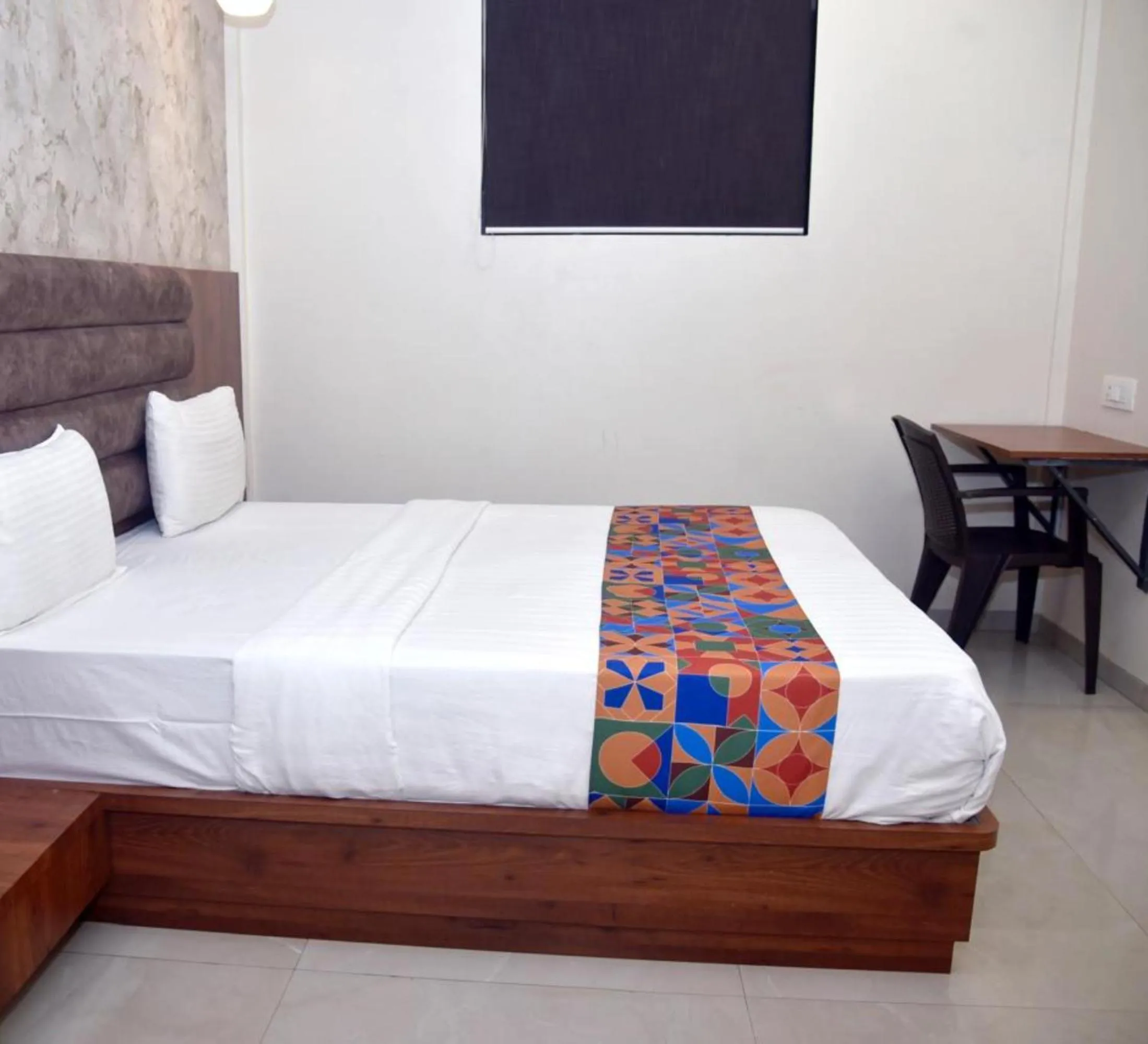 Bed in Hotel Pride Inn