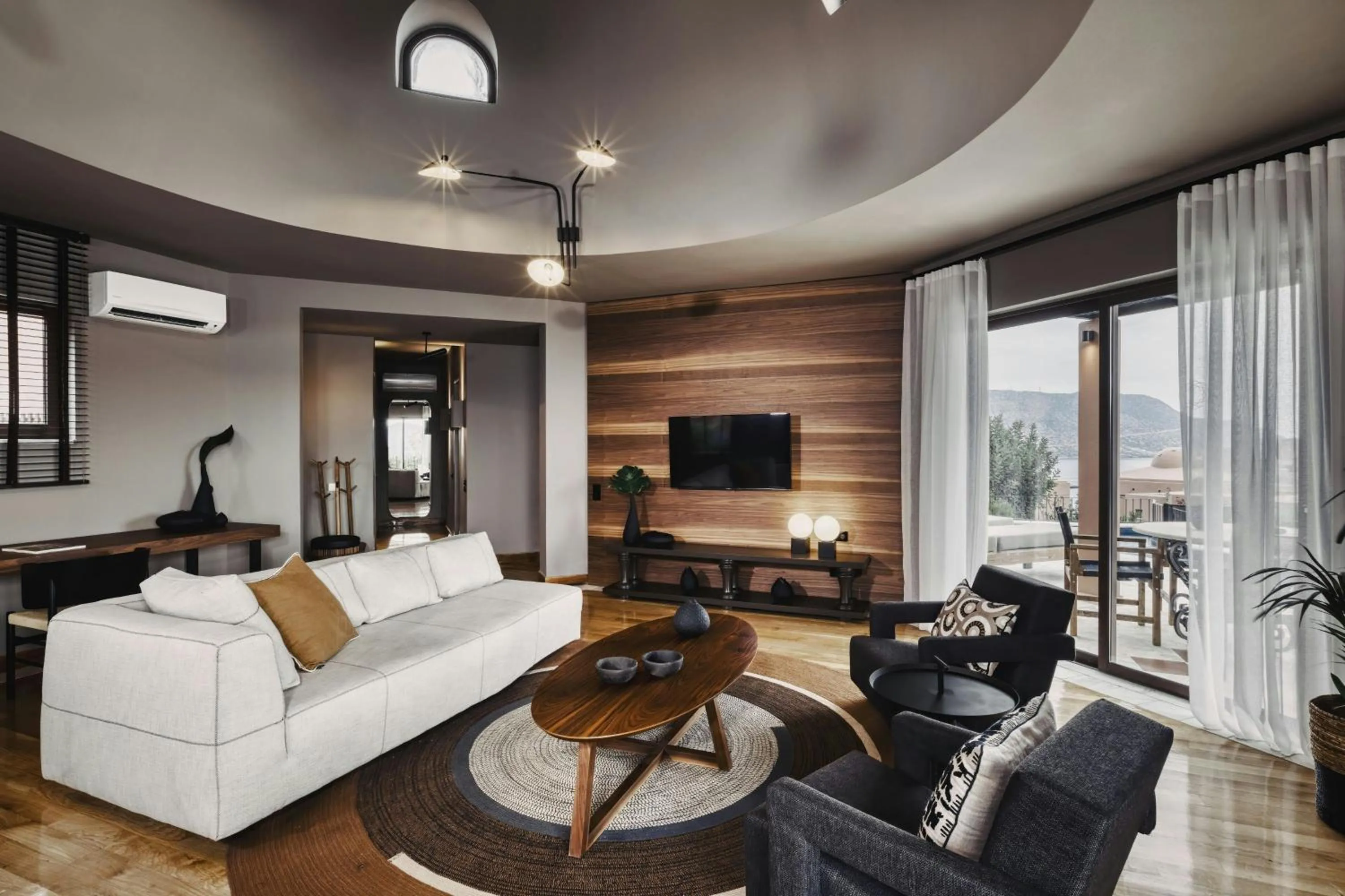Living room in Domes of Elounda, Autograph Collection