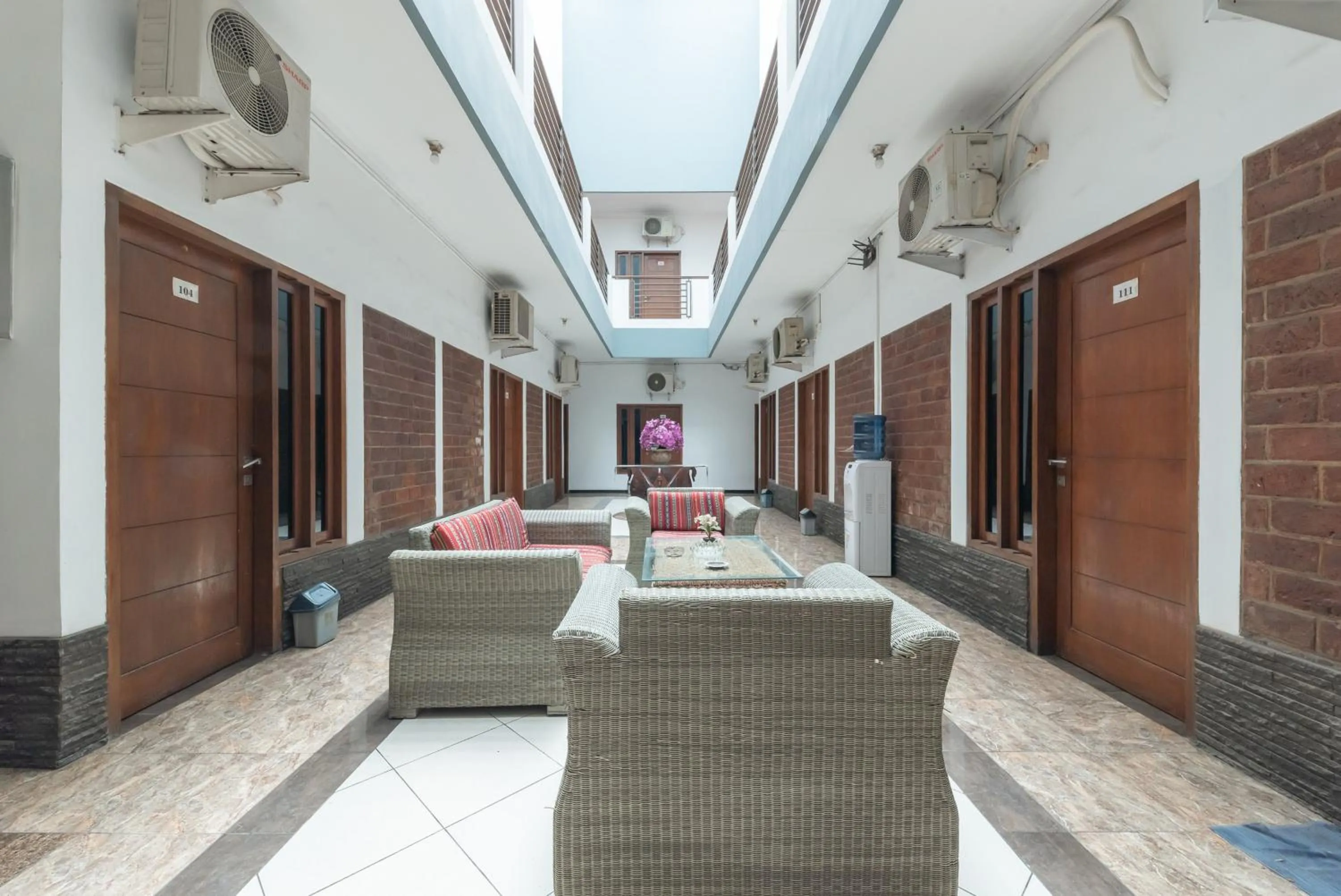 Seating area in Sans Stay Skyland Pasteur Bandung