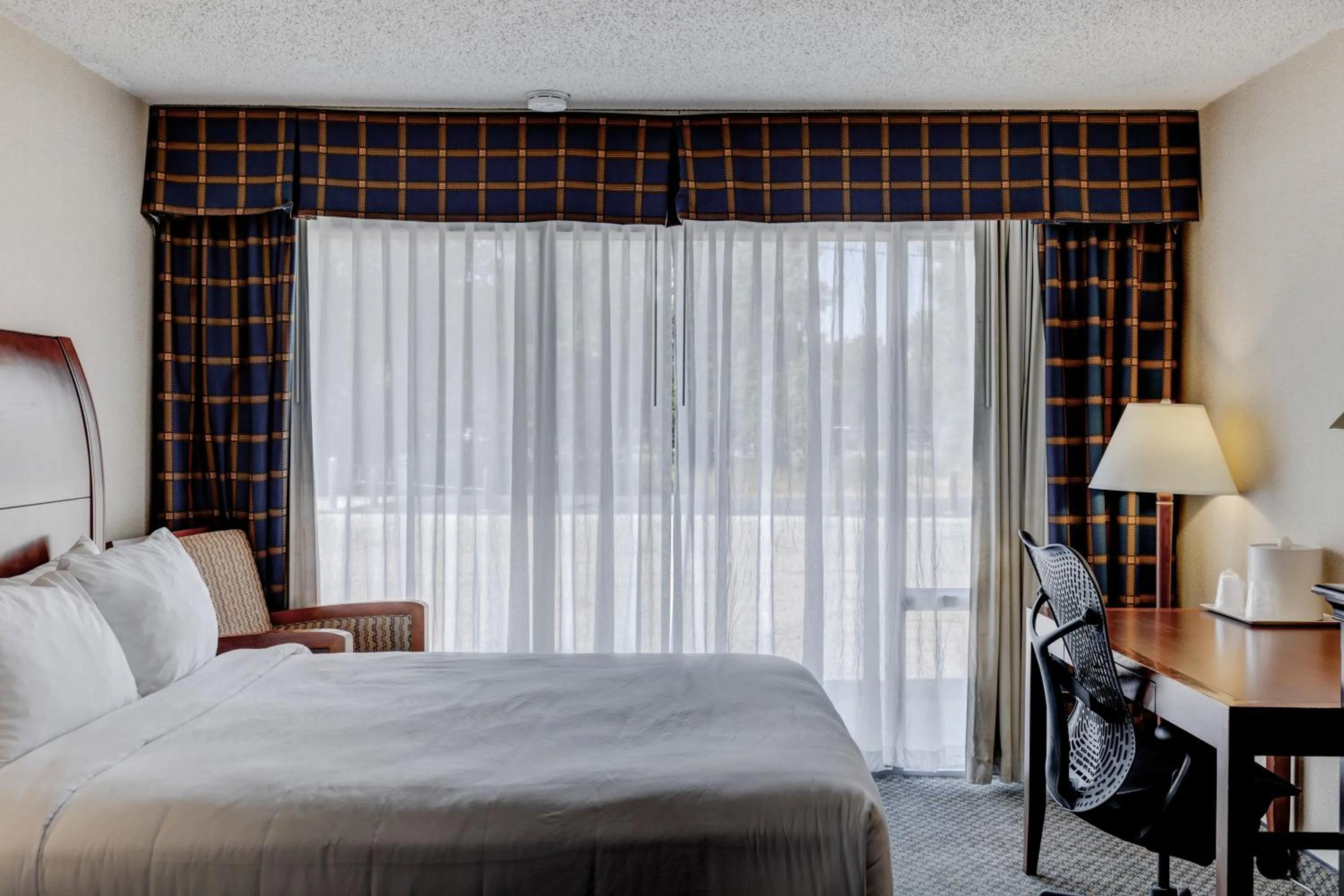 Photo of the whole room, Bed in Riverside Hotel