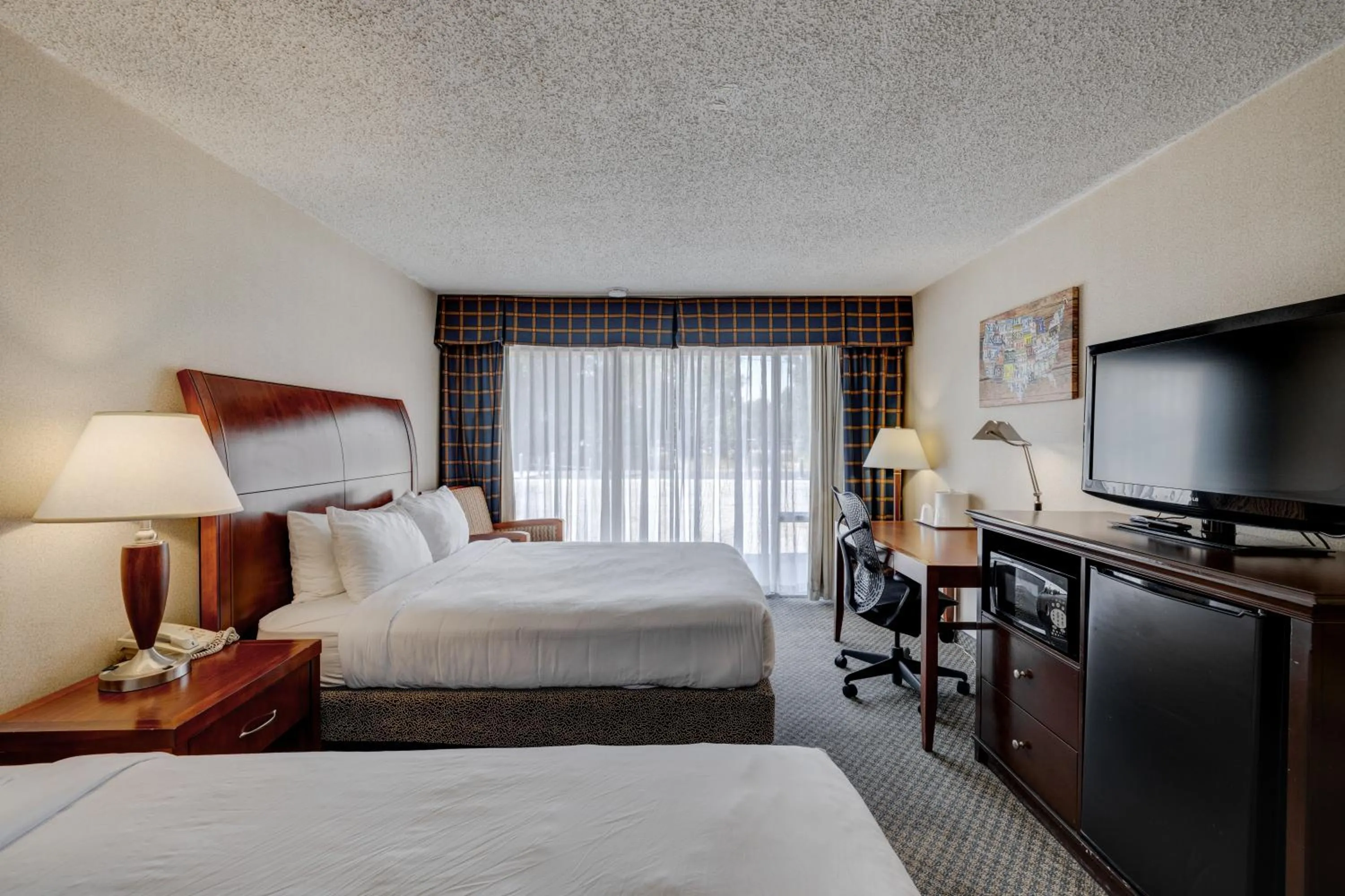 Photo of the whole room, Bed in Riverside Hotel