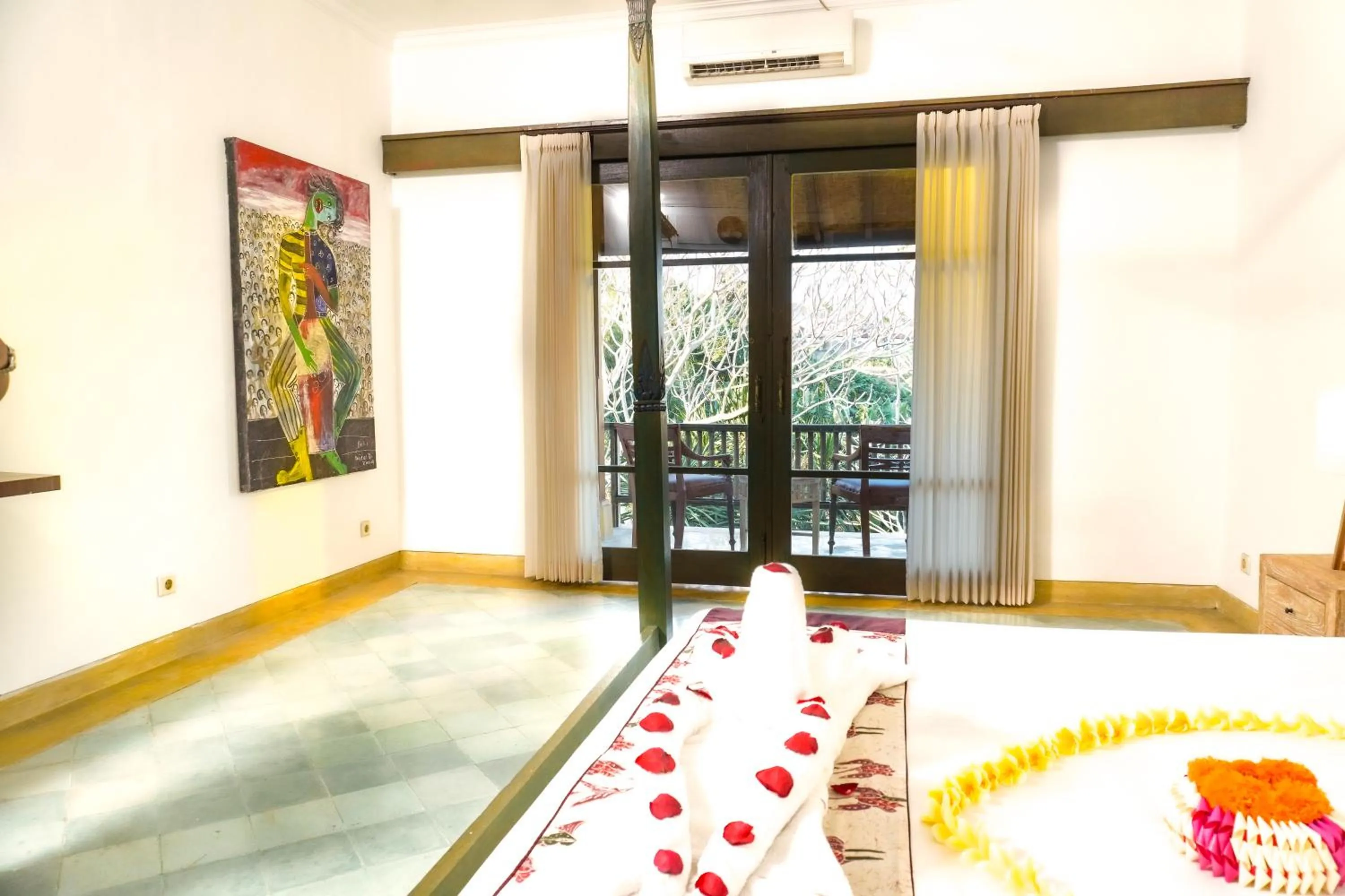 Bed in Alam Puri Art Museum and Villas