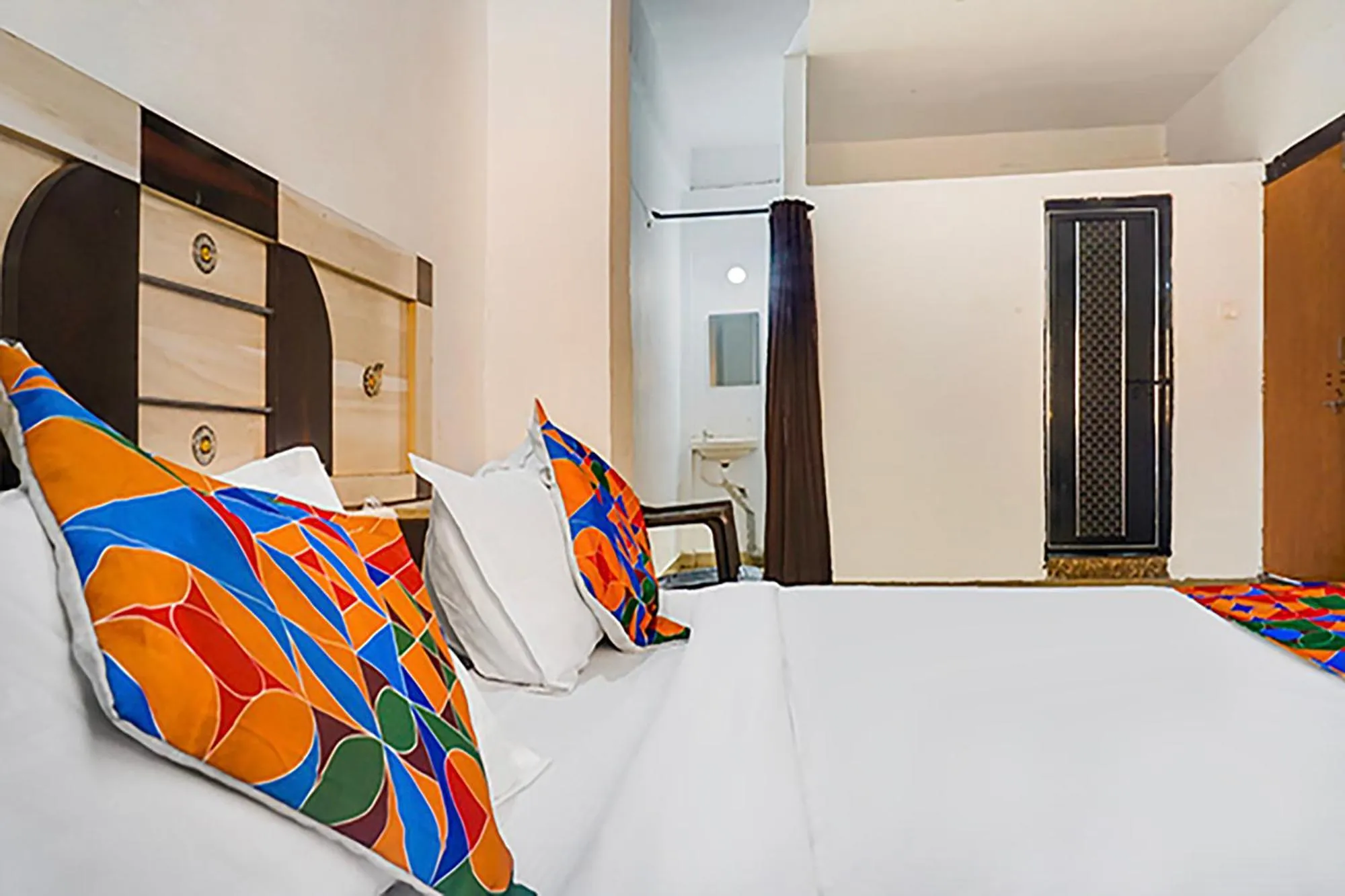 Bed in FabHotel Galaxy Airport Inn, Airport Road