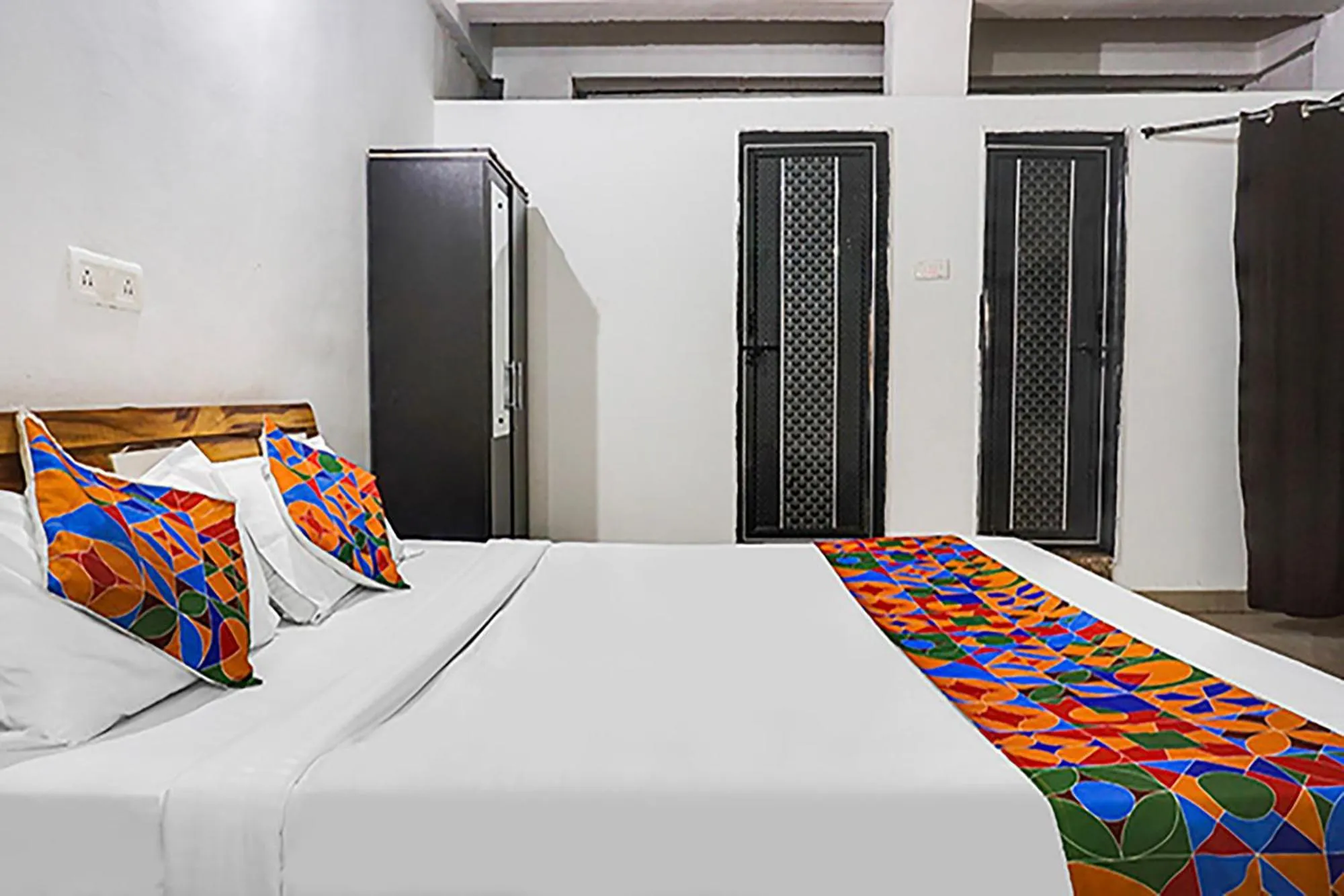 Bed in FabHotel Galaxy Airport Inn, Airport Road