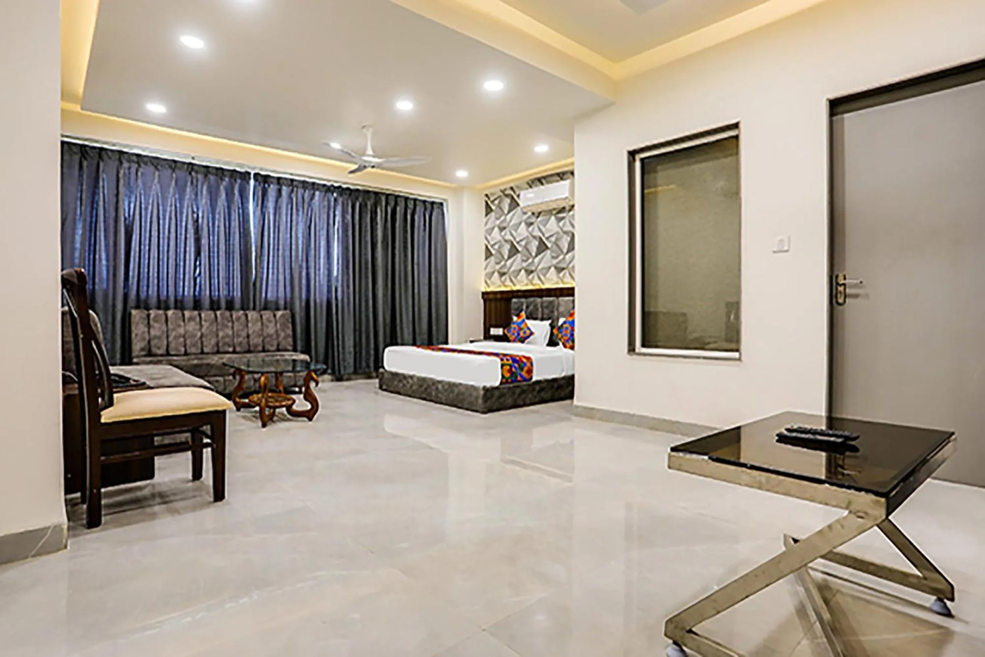 Bed in FabHotel Prime Panchwati Regency