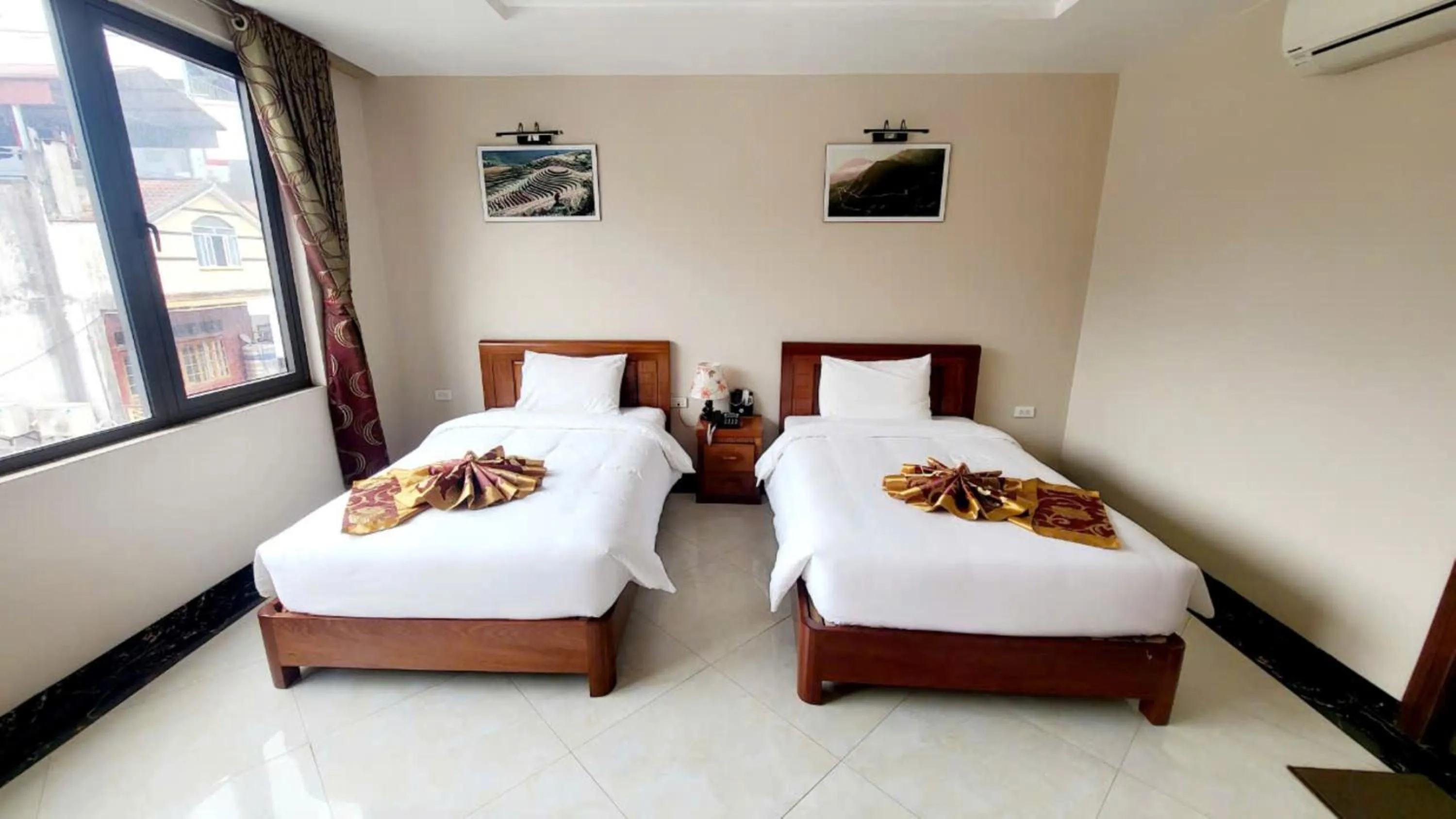 Bed in New Sun Hotel Sapa