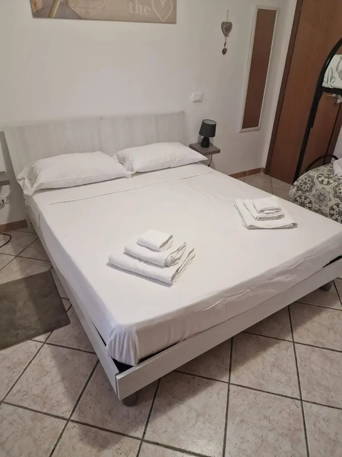 Quadruple Room with Private Bathroom in Le stanze di Aurora Quadruple Room with Private Bathroom in Le stanze di Aurora