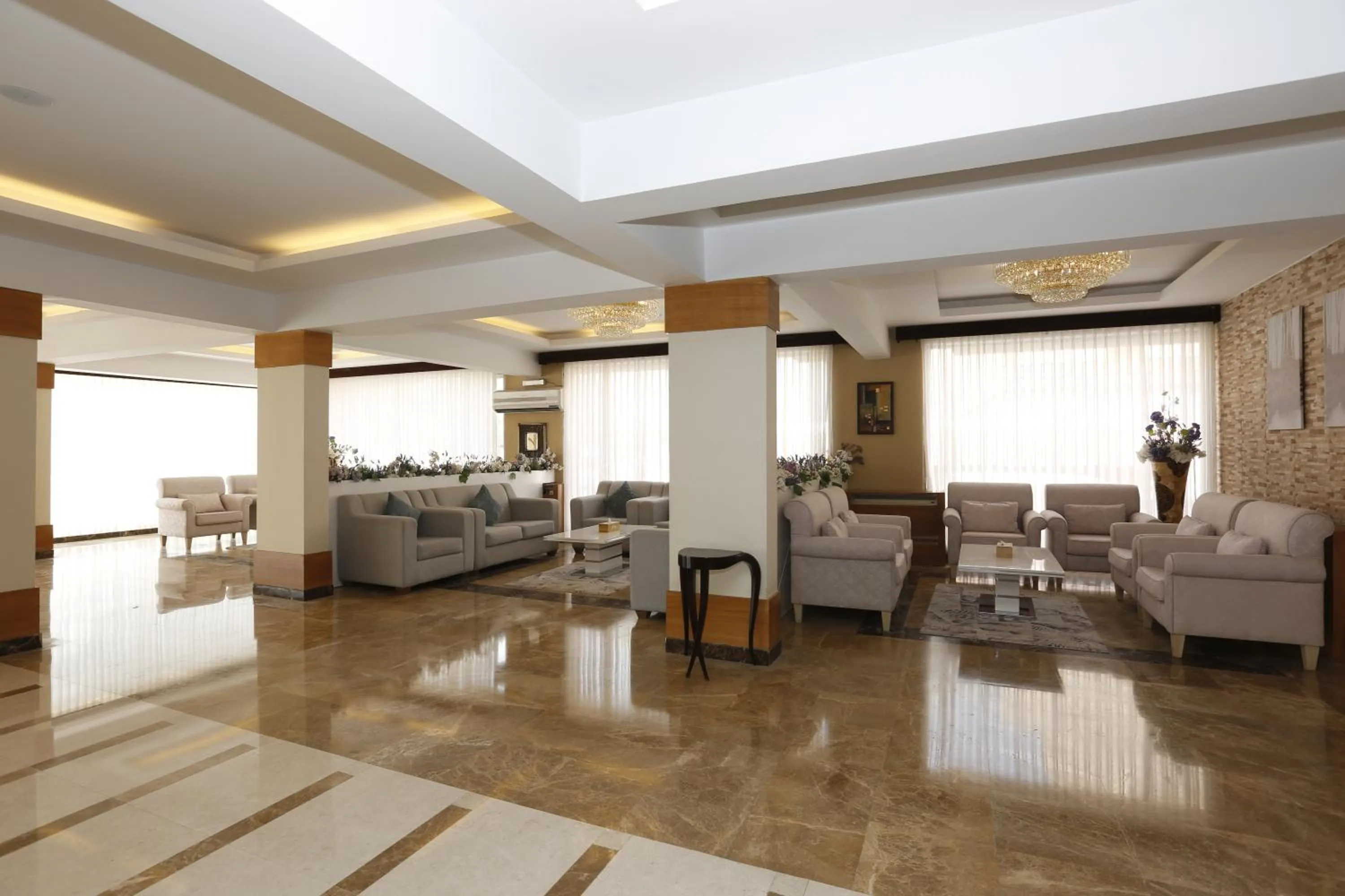 Seating area in Hotelier Suites by Cantonal