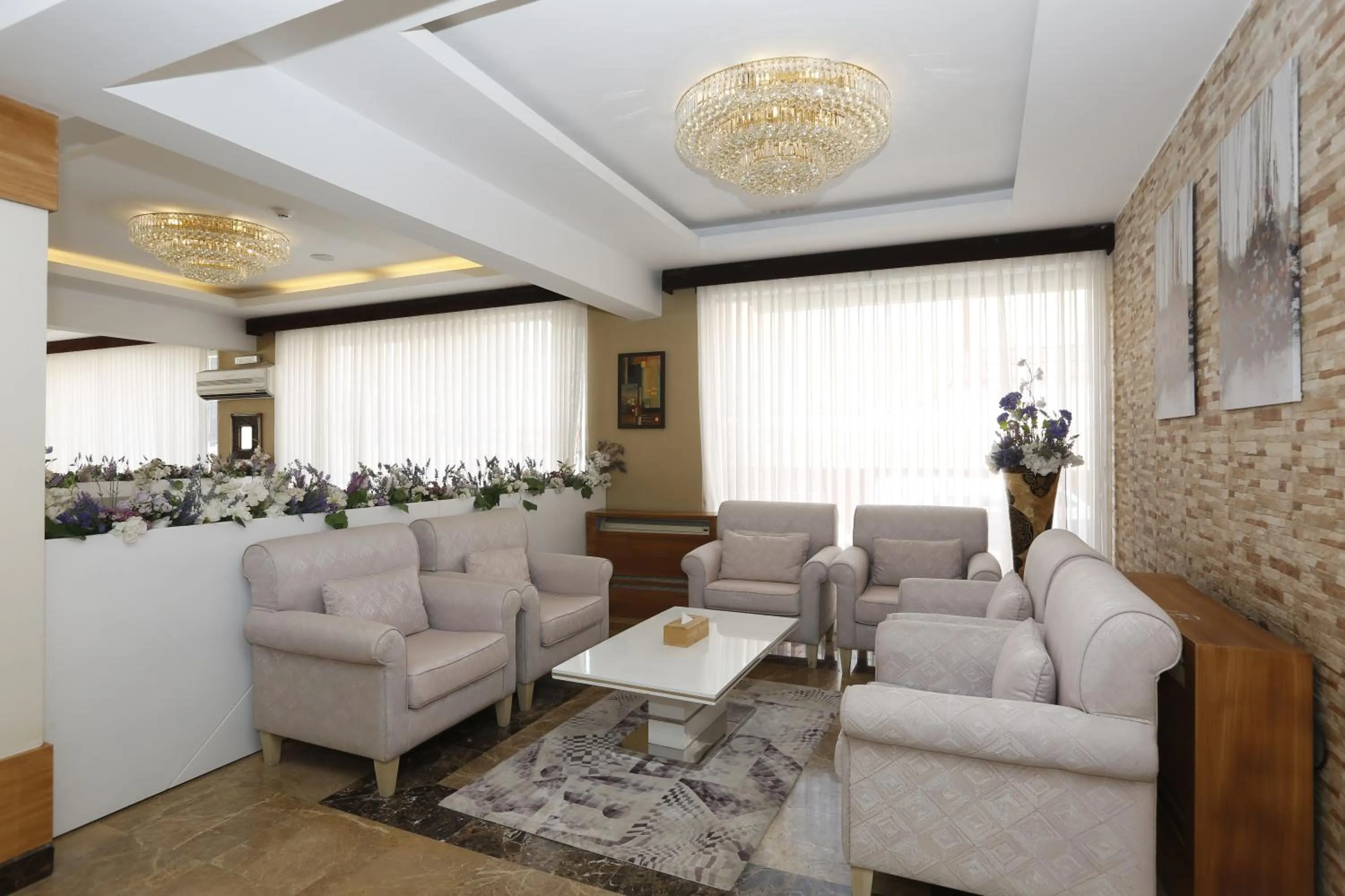 Seating area in Hotelier Suites by Cantonal