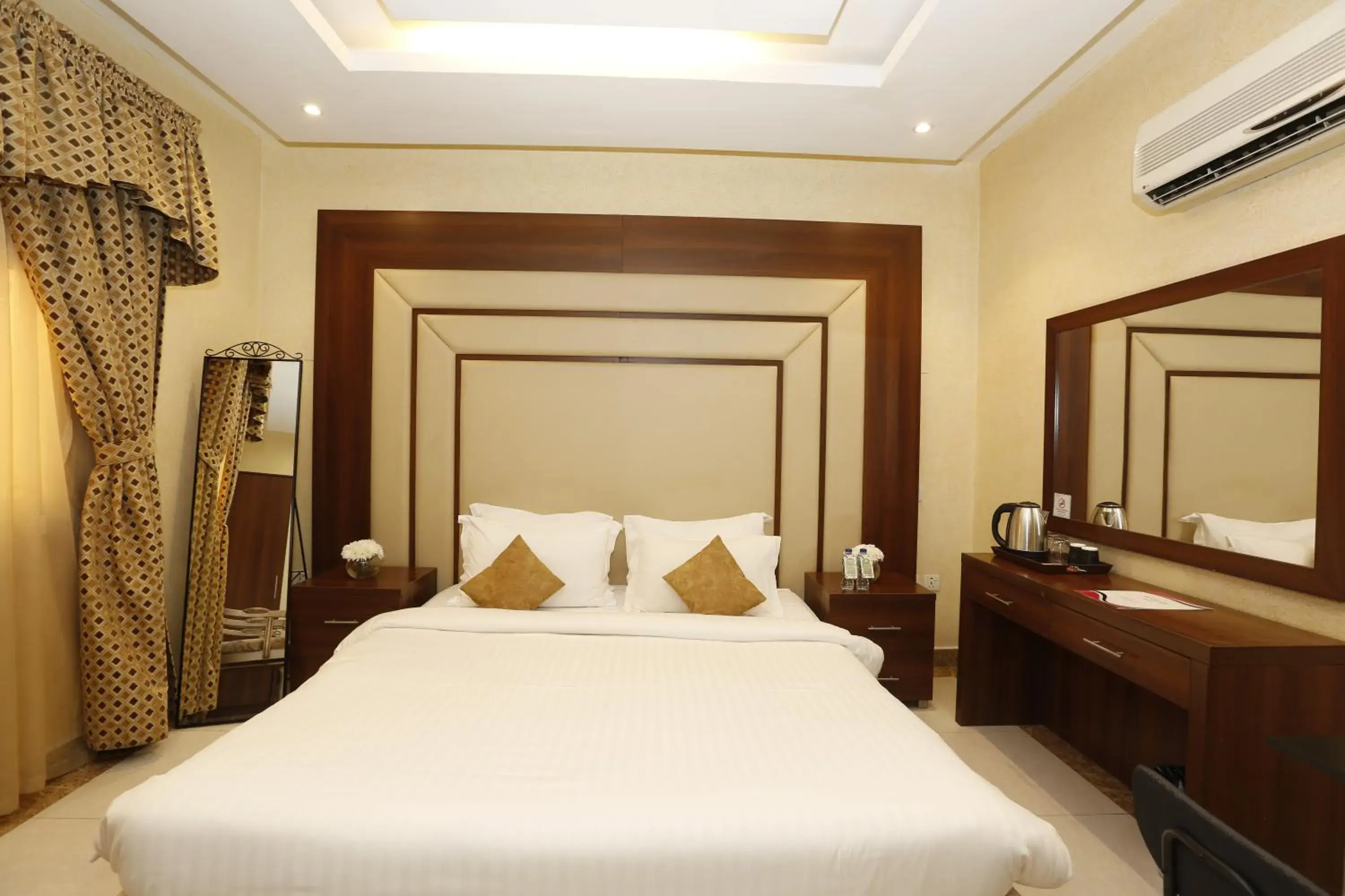 Standard King Room - single occupancy in Hotelier Suites by Cantonal Standard King Room - single occupancy in Hotelier Suites by Cantonal