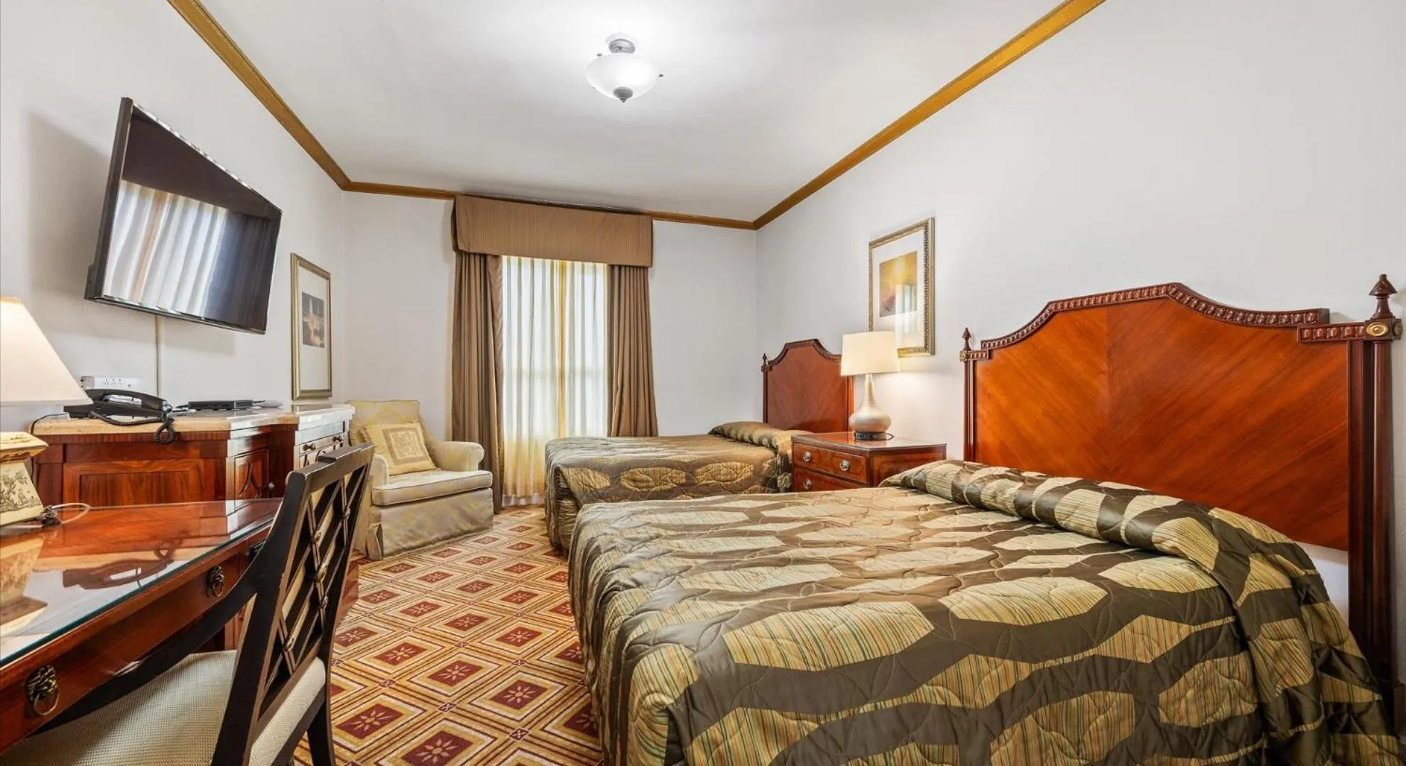 Bed in EMBASSY HOTEL