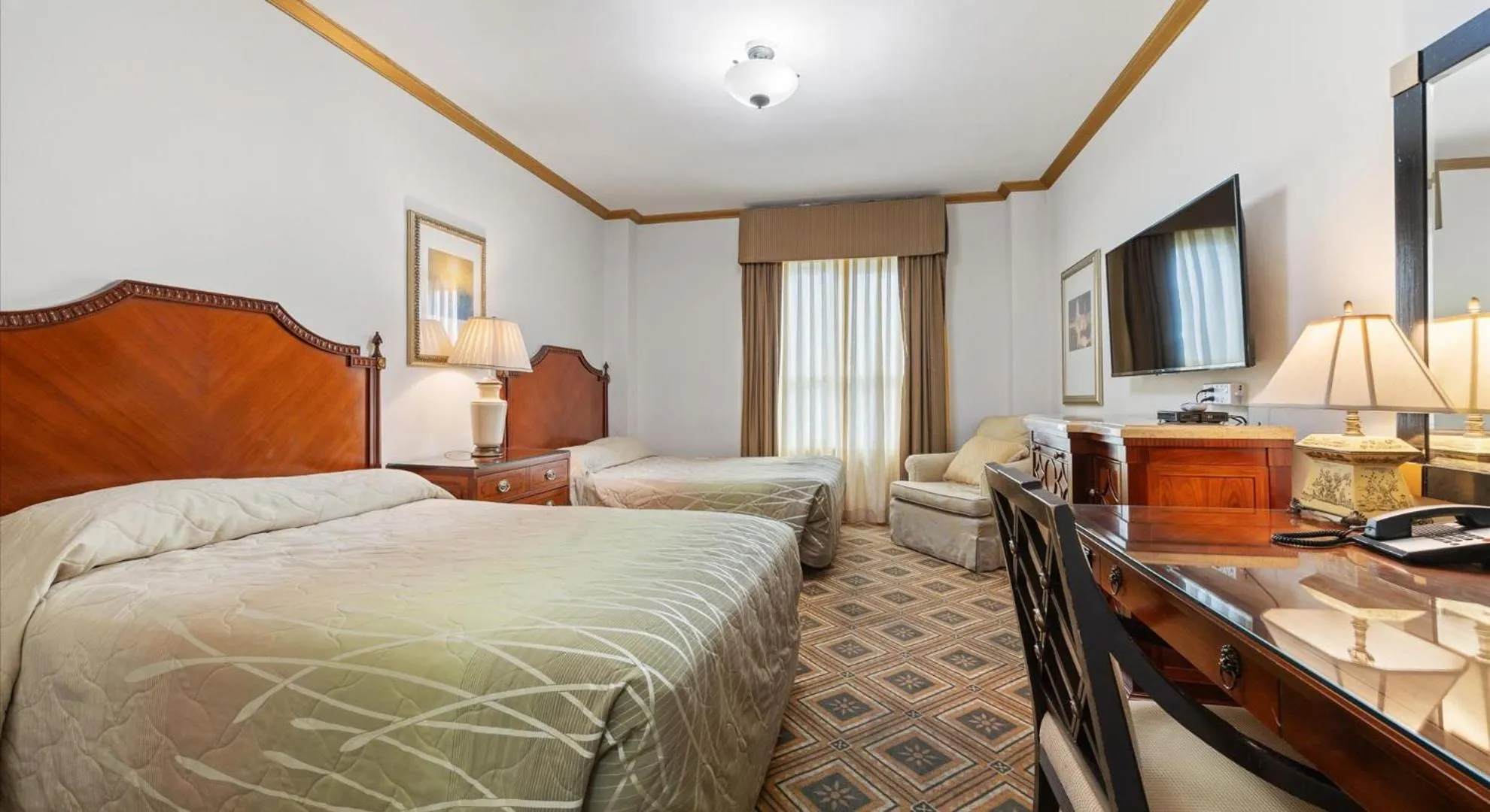 Bed in EMBASSY HOTEL