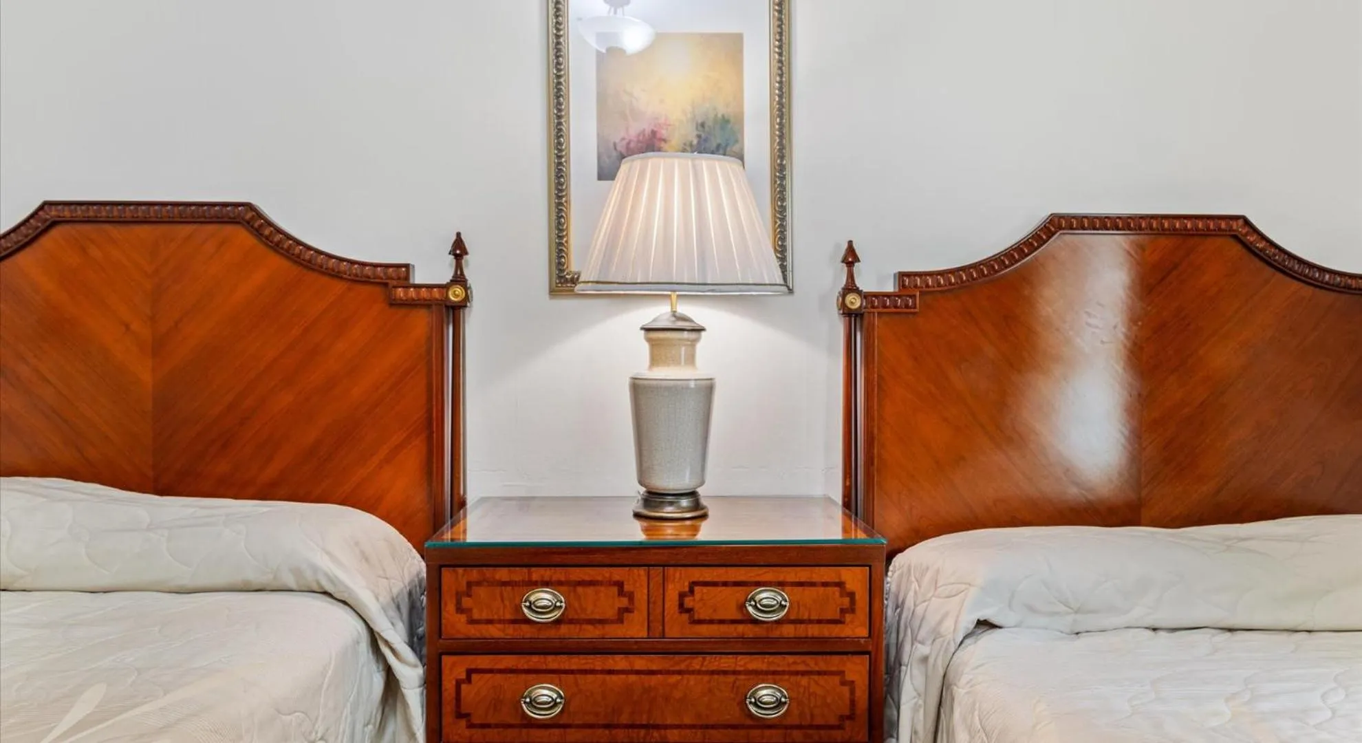 Bed in EMBASSY HOTEL