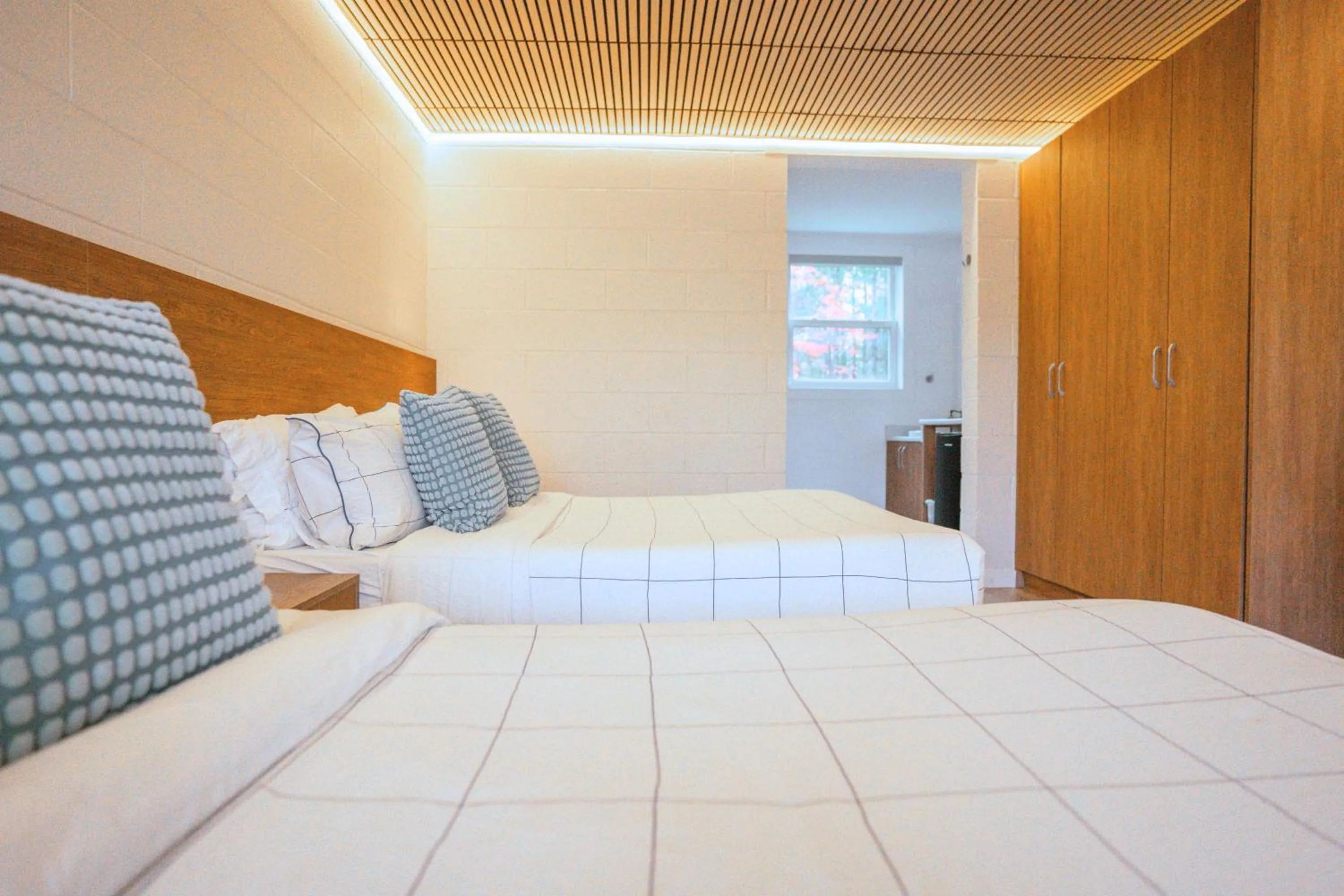 Bed in Stay Inn Muskoka