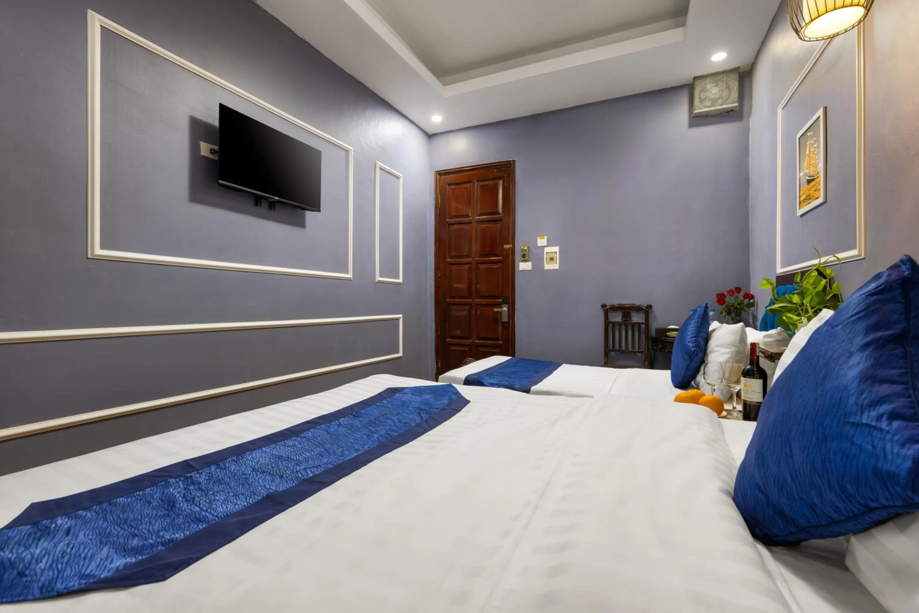 Bed in Amanda Boutique Hotel & Travel