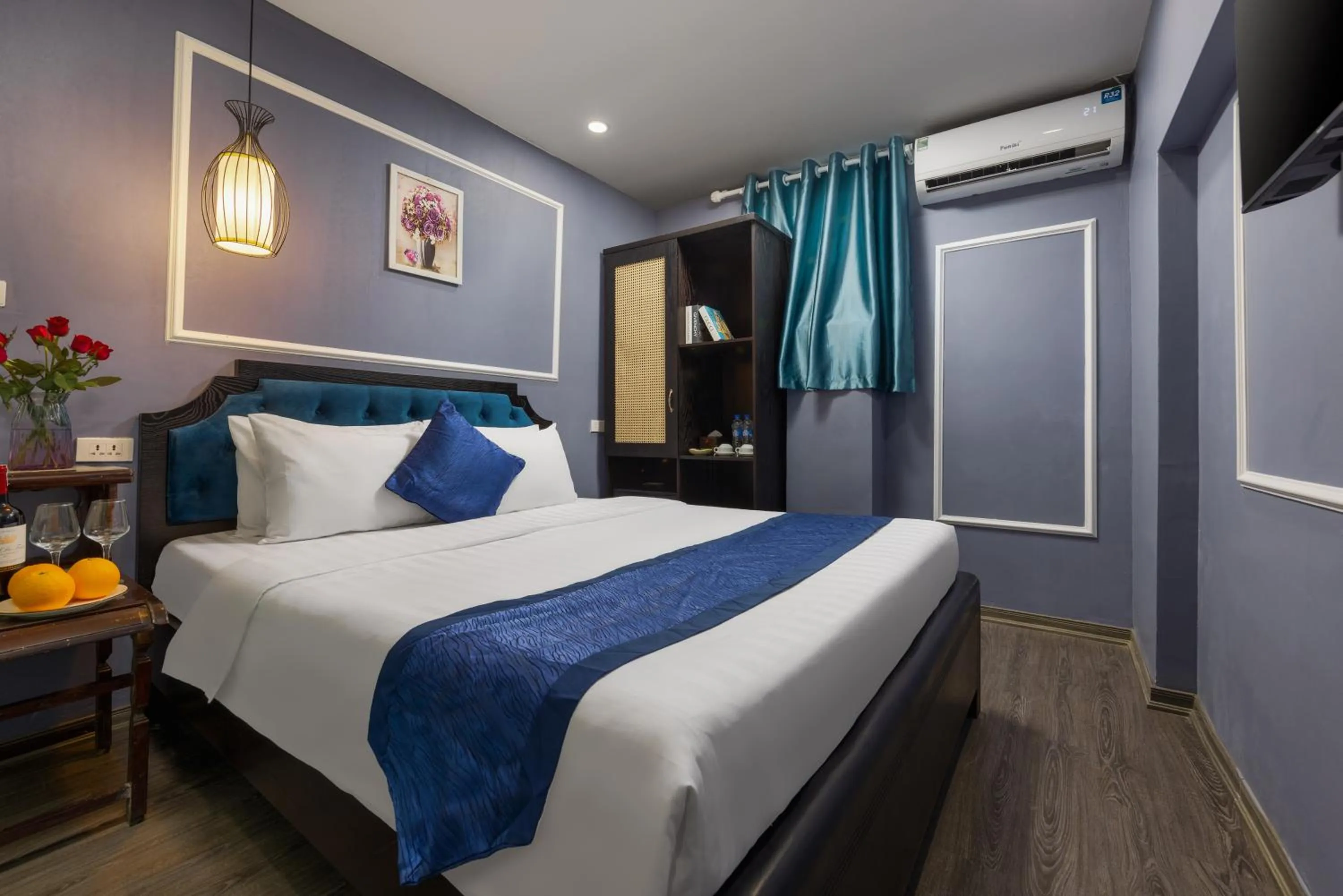 Bed in Amanda Boutique Hotel & Travel