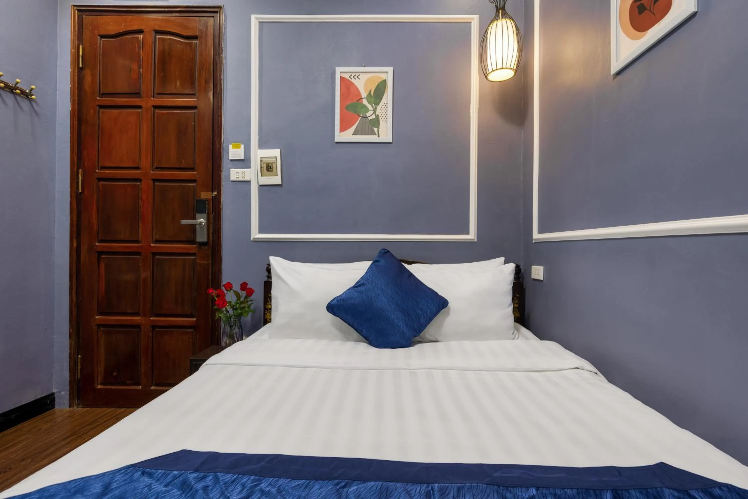 Bed in Amanda Boutique Hotel & Travel