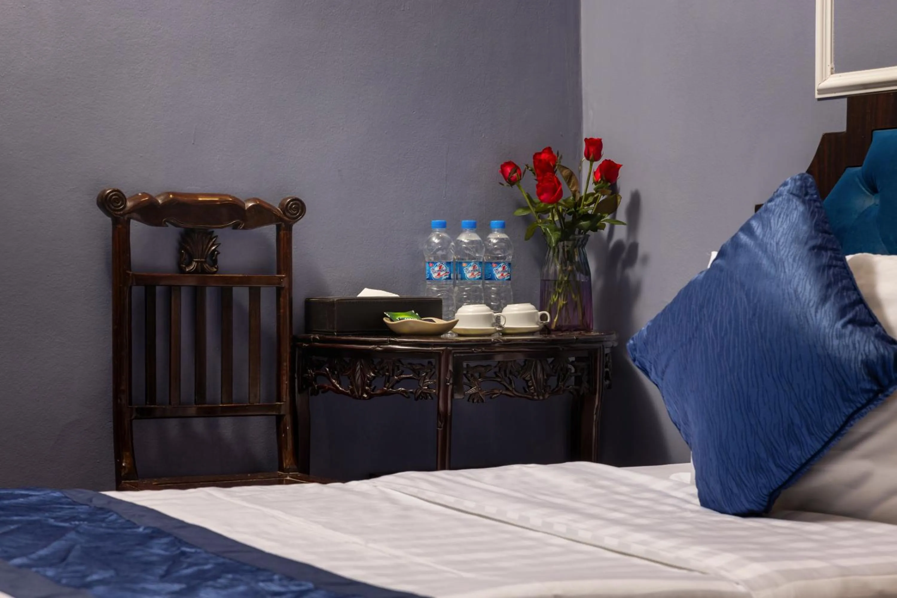 Bed in Amanda Boutique Hotel & Travel