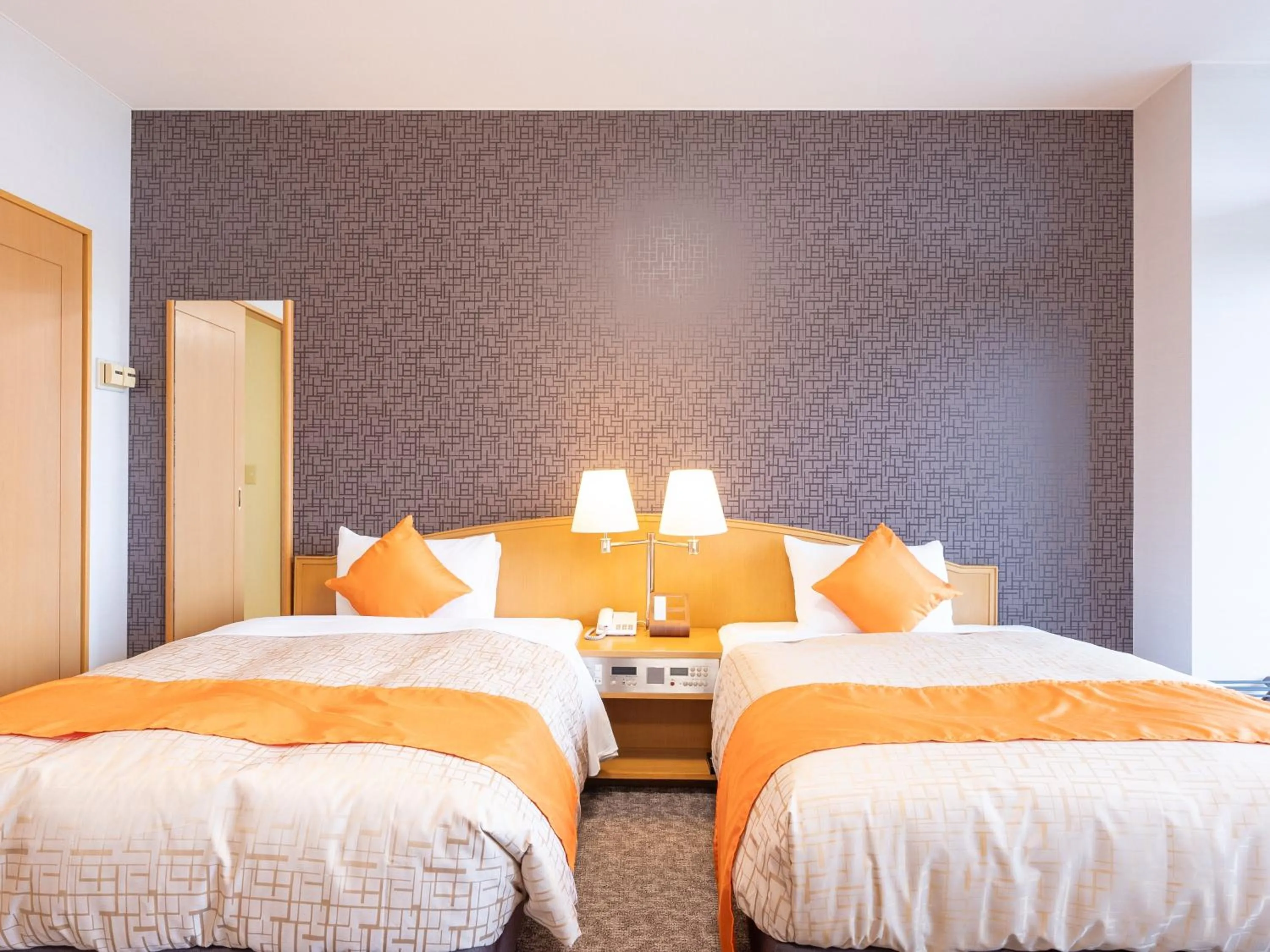 Bed in LiVEMAX Resort Upopoi Shiraoi Onsen